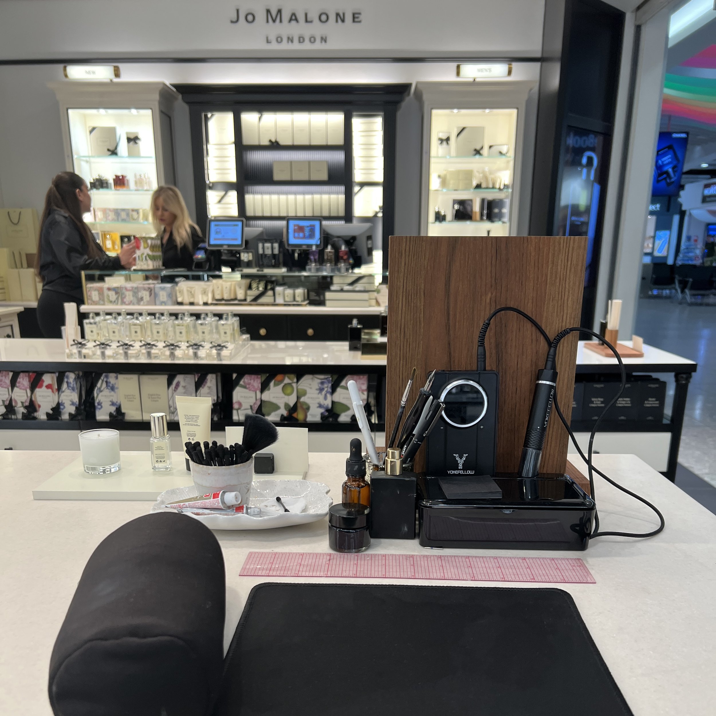 On-site calligraphy and engraving tools set up for a Jo Malone London brand activation