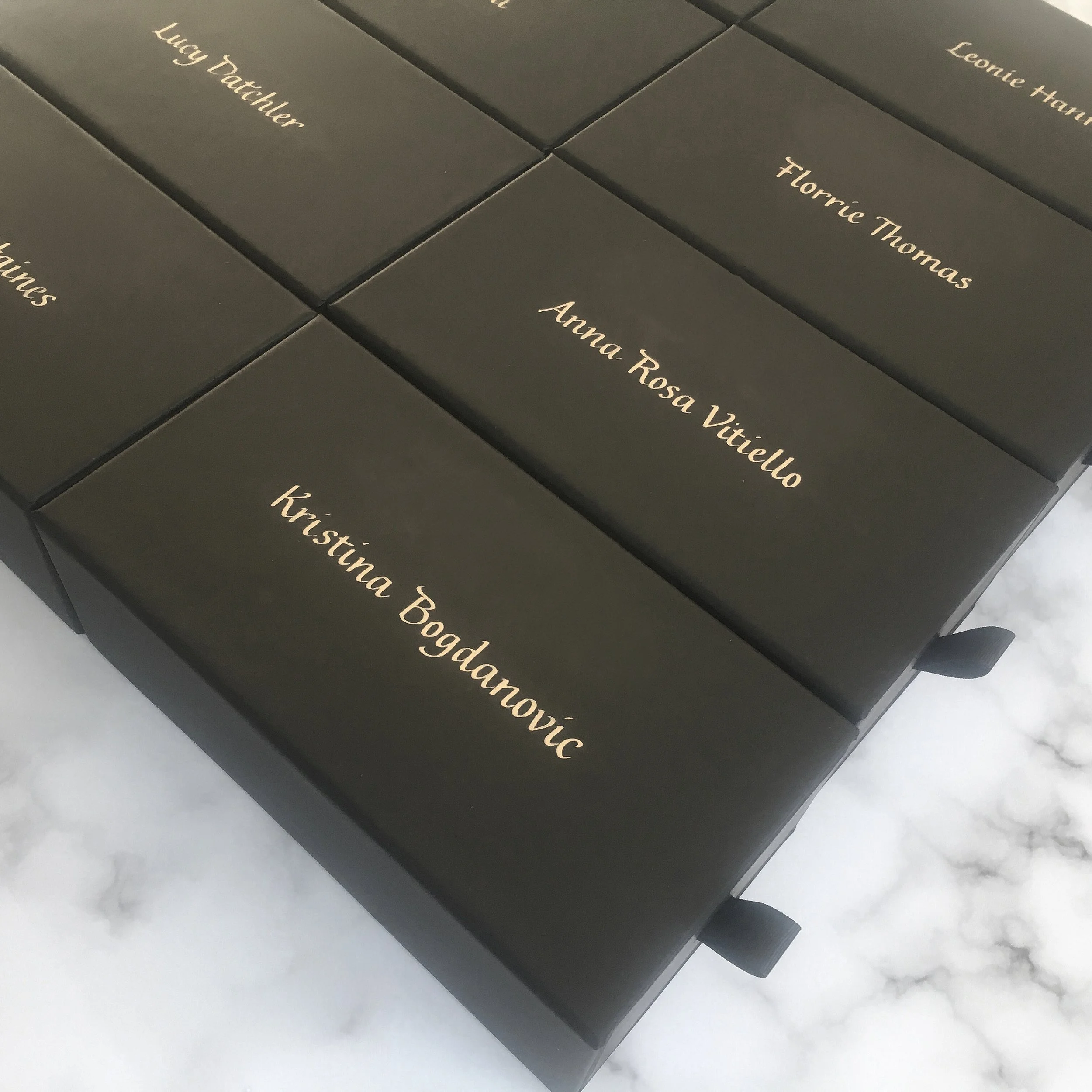 Studio-prepared calligraphy on packaging for a brand project.