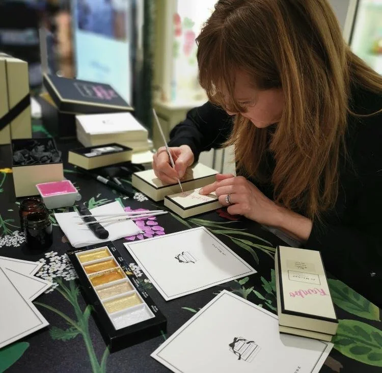 Live painting onto a Jo Malone box at a brand activation