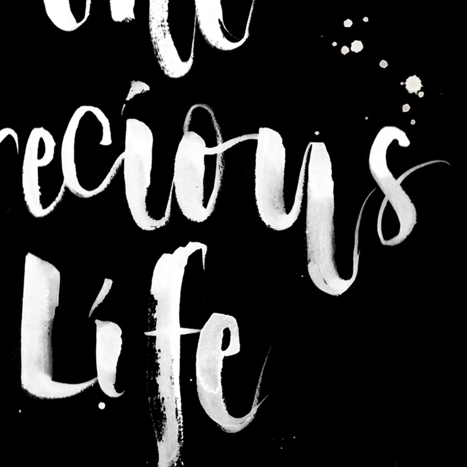 Close up of a contemporary brush lettering calligraphy style showing relaxed spacing and controlled hand lettering