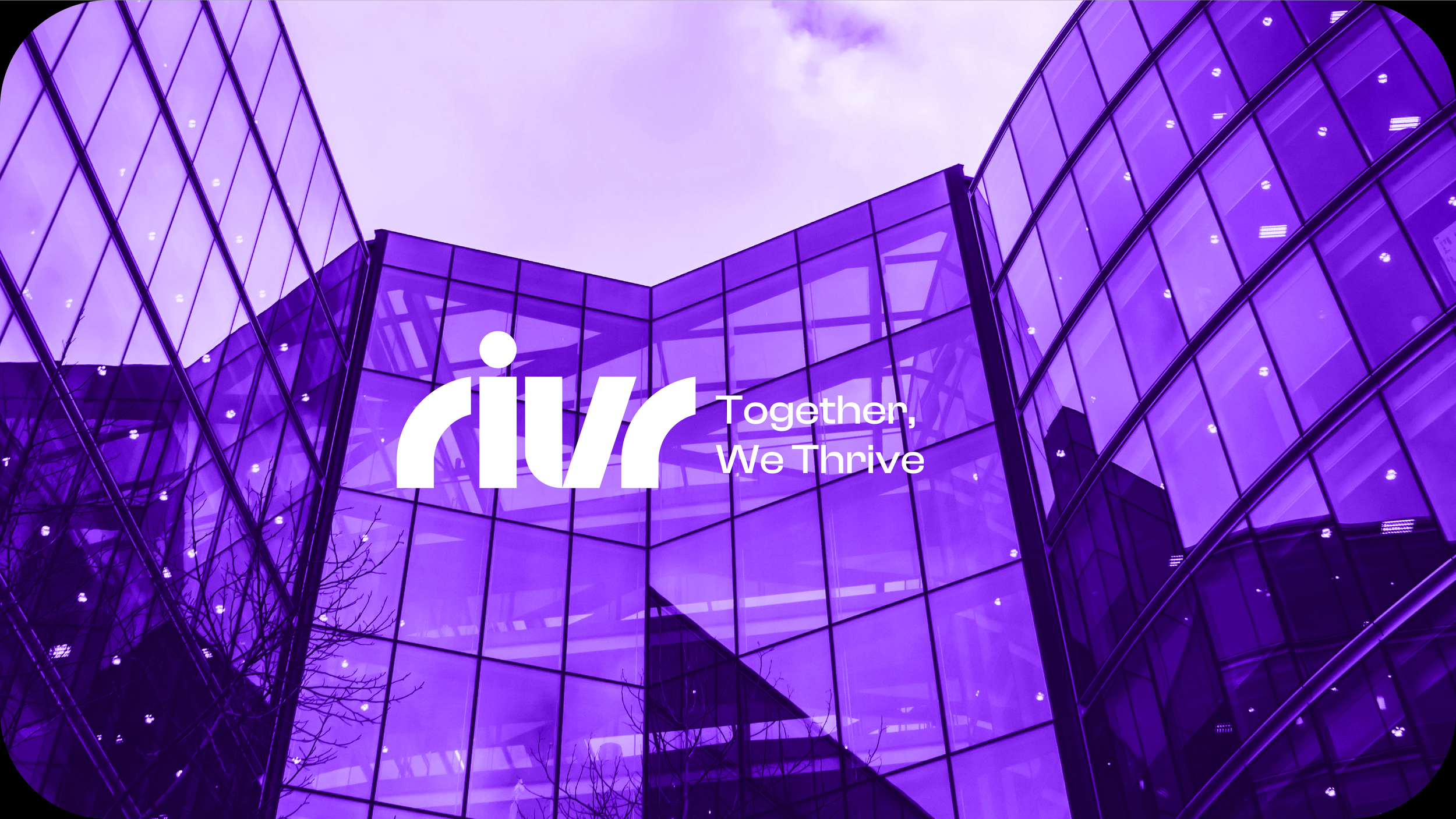 A modern glass building with a purple hue and the company logo and slogan 'IVIV Together, We Thrive' displayed on the facade.