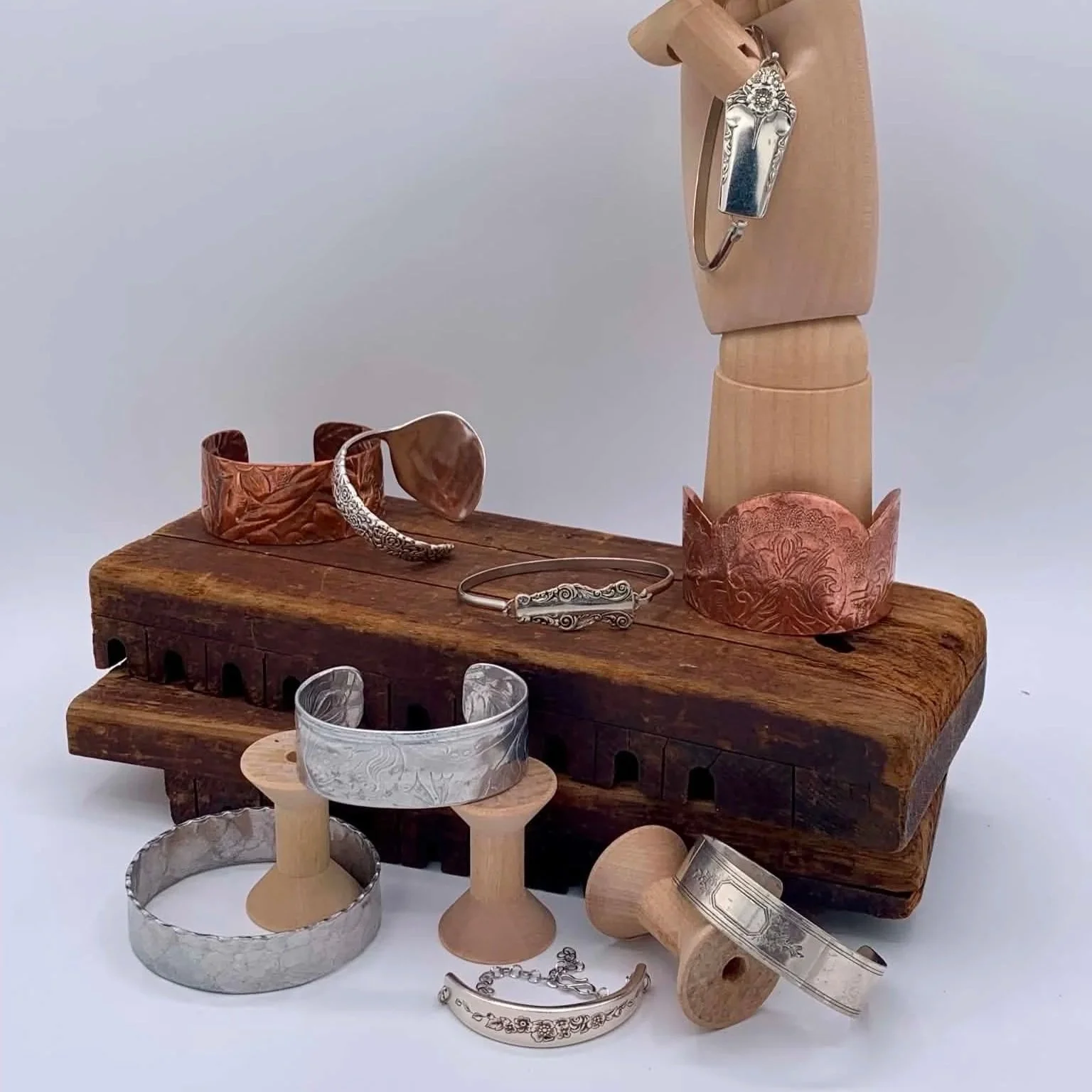 Serving Silver:
5 styles of cuffs, bangles & bracelets made from vintage flatware, serving trays & wire.
