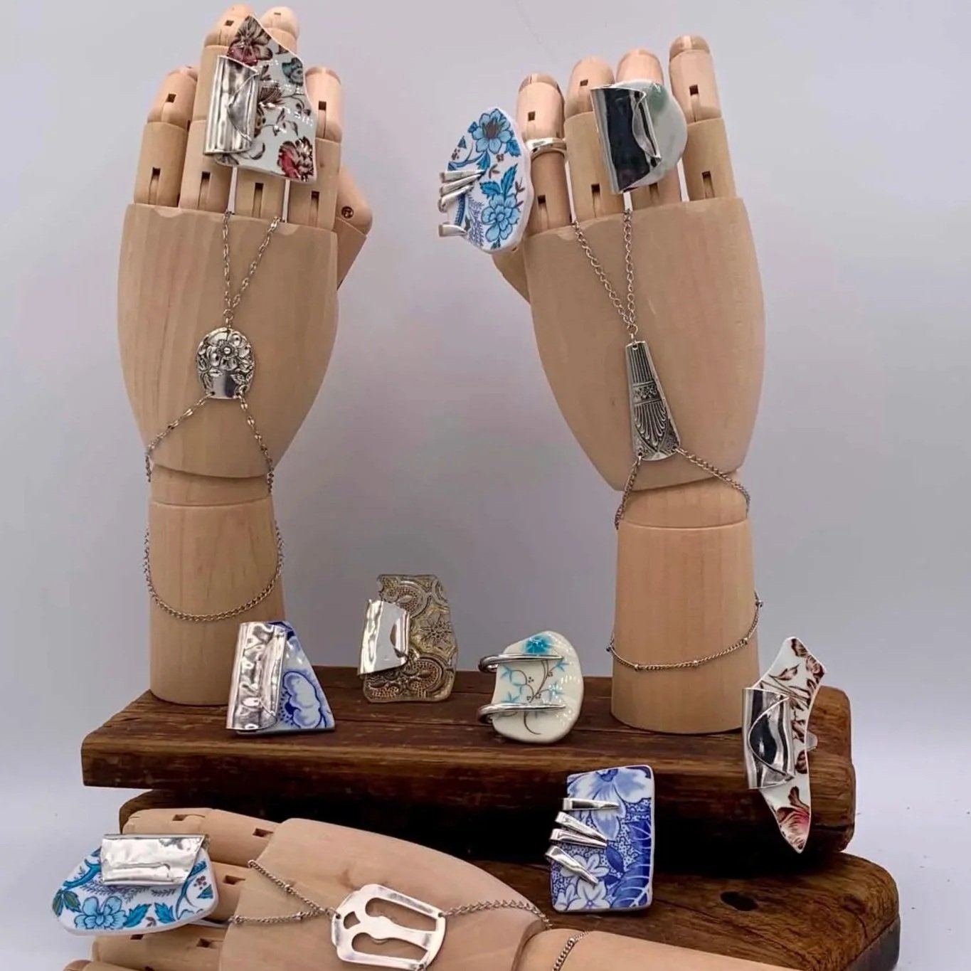 Serving Silver:
Hand chain bracelets using delicate chain & flatware handles. Rings using vintage broken vintage china & bent flatware.