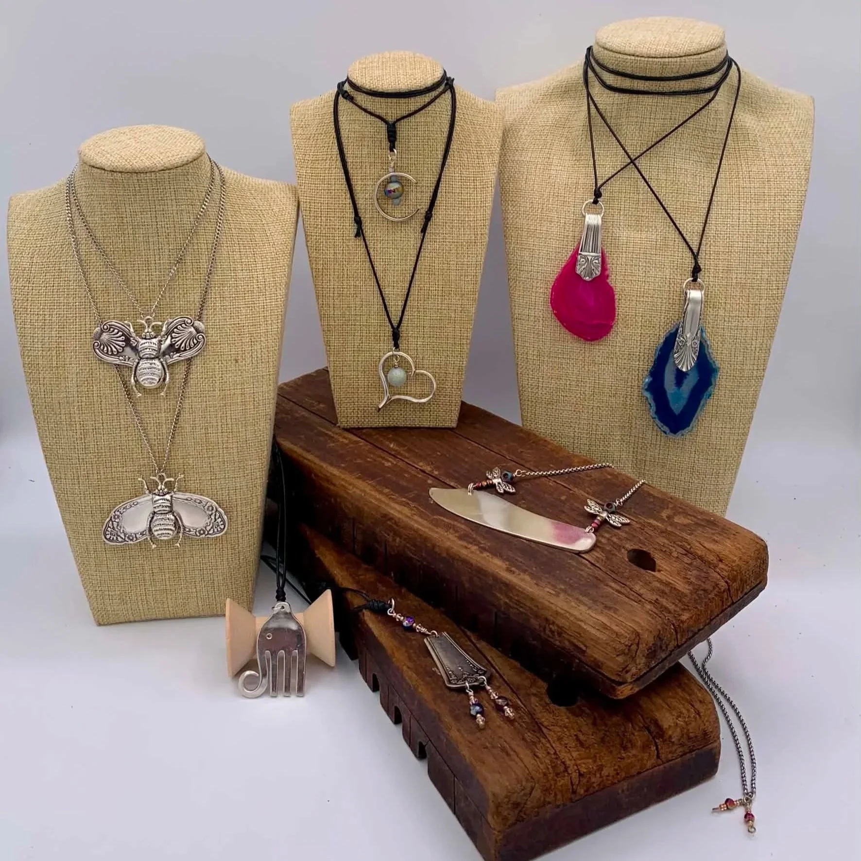 Serving Silver:
7 styles of necklaces. Made from either the flatware's handles, blades, bent fork tines paired with glass beads or stones.