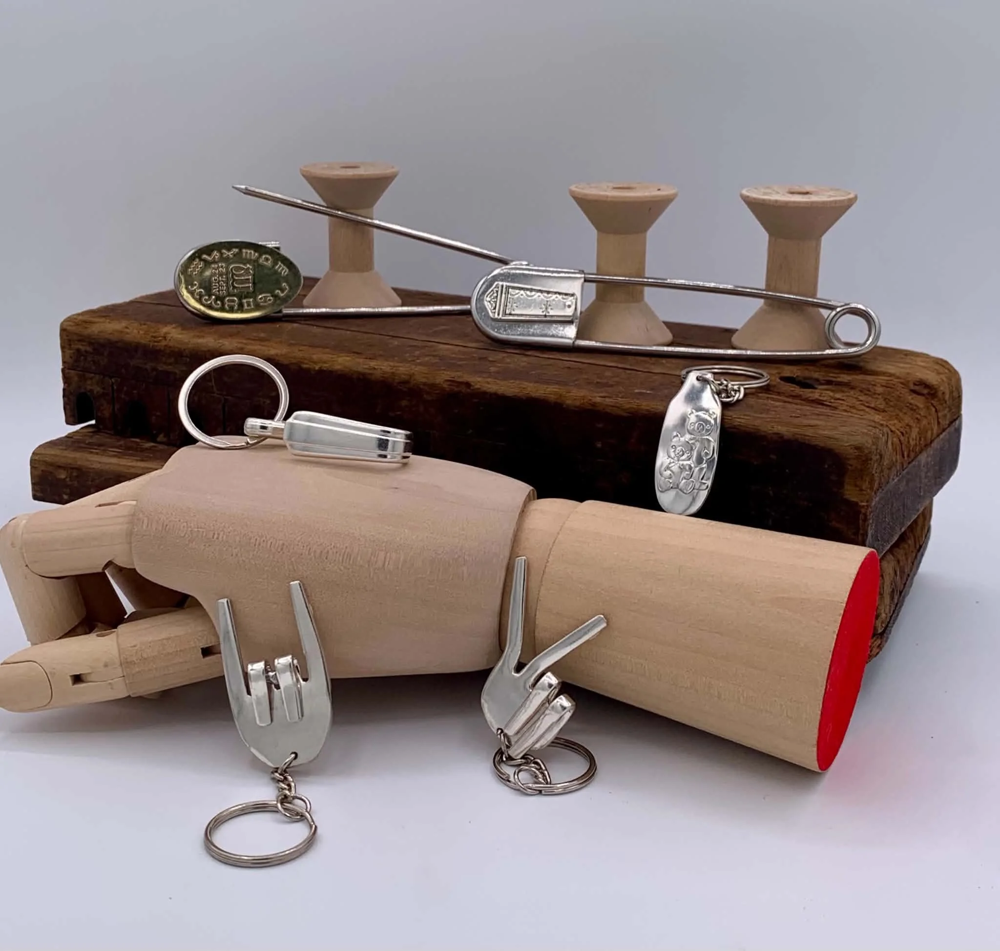 Serving Silver:
4 styles of keychains using either the handles, spoon bowls or bent fork heads.
