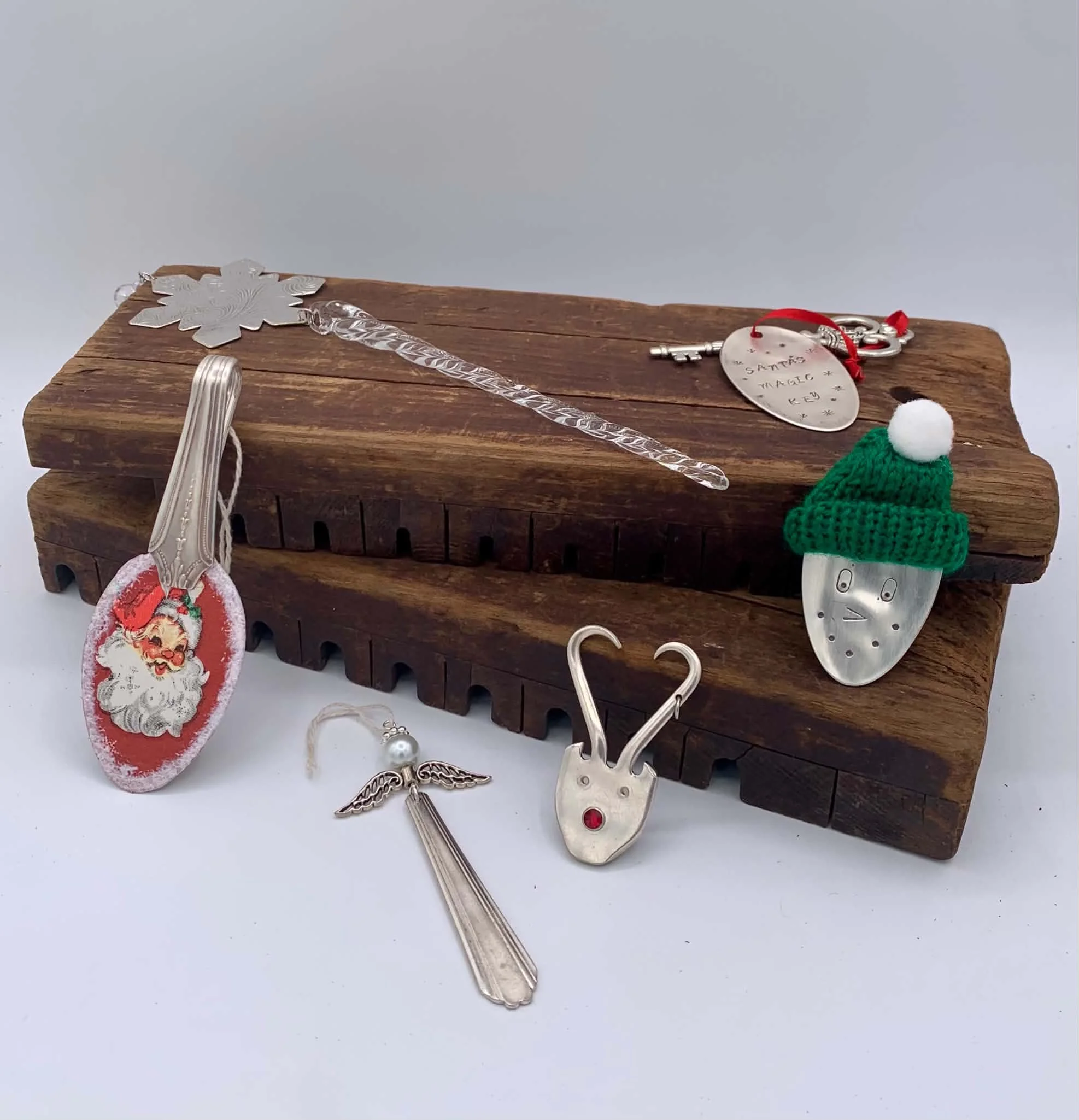 Serving Silver:
Holiday ornaments made from vintage flatware, serving tray, glass & napkins.