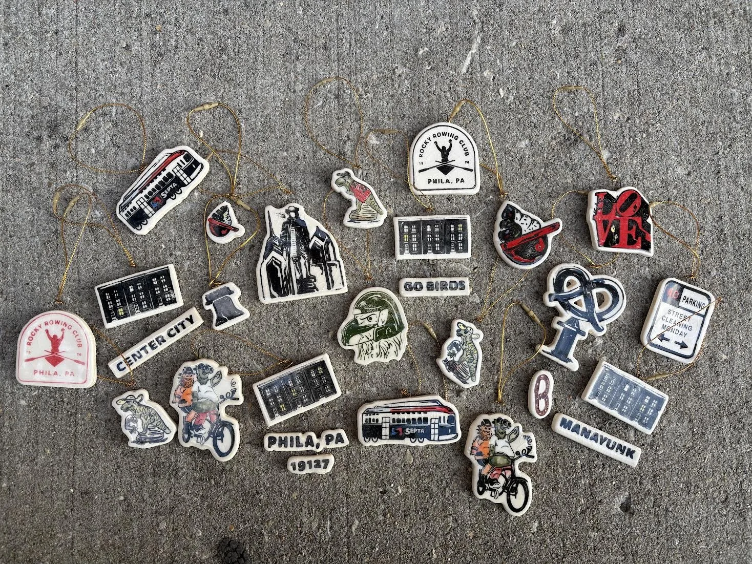 BabyFace Studio:
Stoneware, cone 6, underglaze, glaze, screen printing on clay
Handmade/painted ceramic ornaments featuring original custom decals inspired by Philly's iconic landmarks, architecture and local culture.