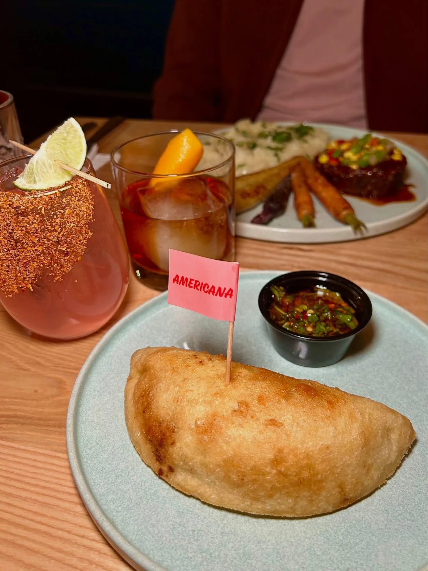 The perfect Denver date night spot 🥃🥟🍋&zwj;🟩✨

La Catira here 🙋🏼&zwj;♀️ Our Empanada Americana is my favorite. It&rsquo;s also our vegan option because we use Impossible ground beef 👀 We prepare this protein choice just like all the others and