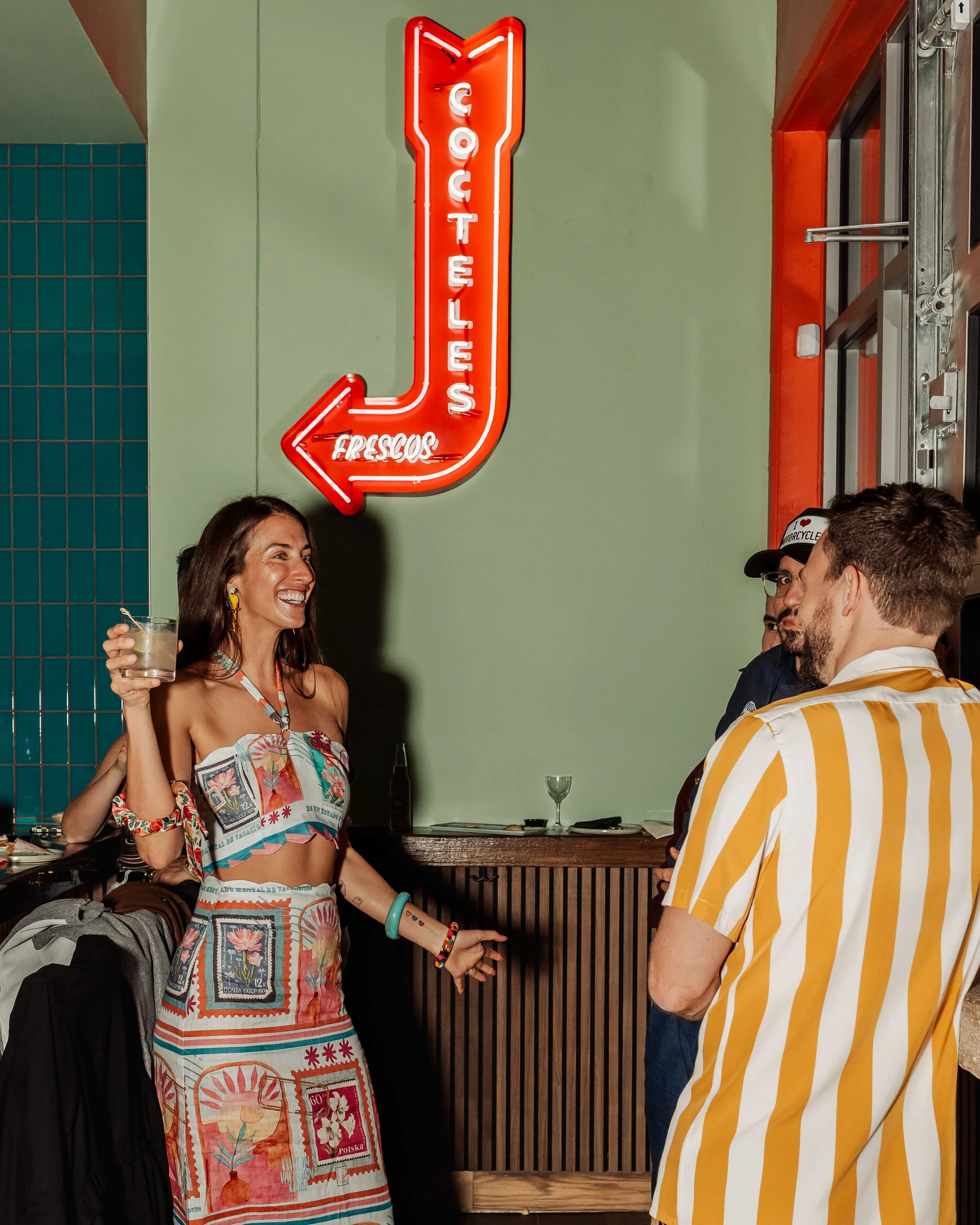 Girl enjoying a drink at the Catira cocktail bar