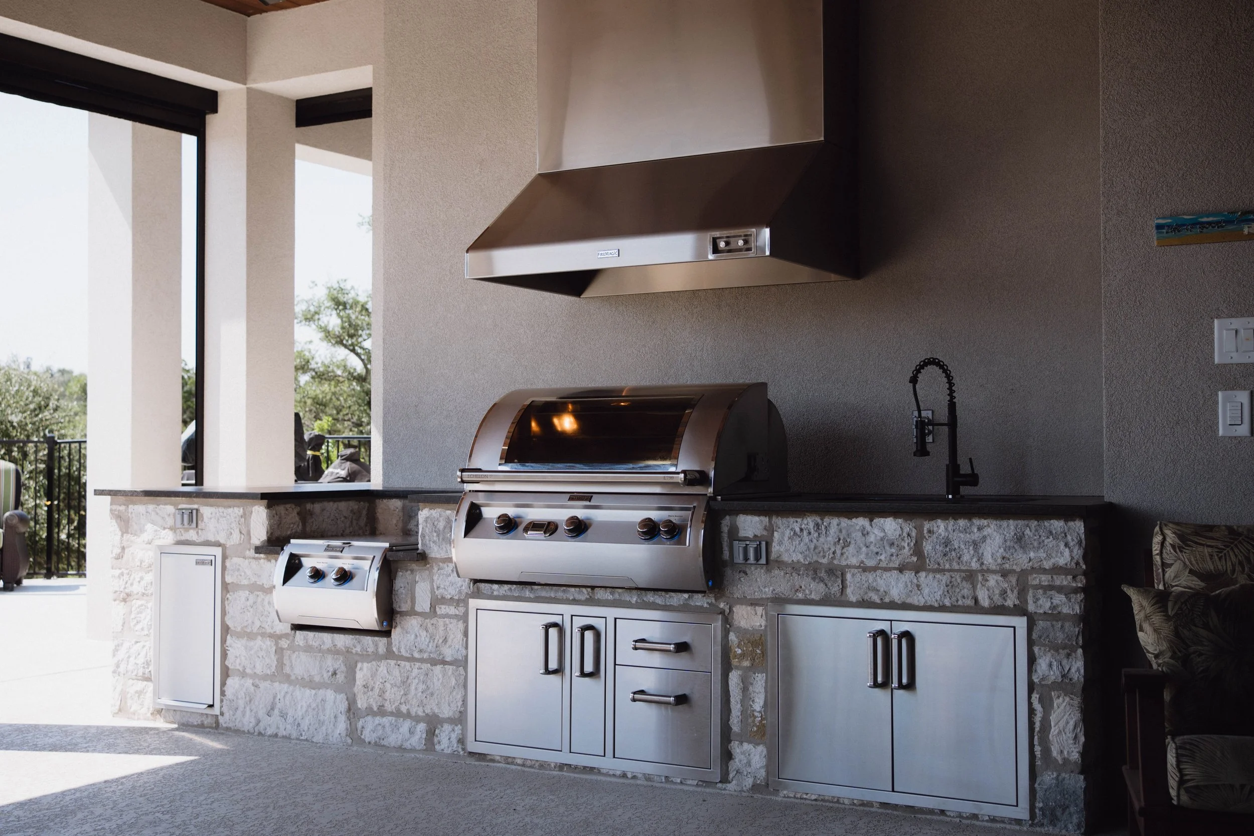 Outdoor Kitchen Install in San Antonio | Cozy Fireplace + Patio