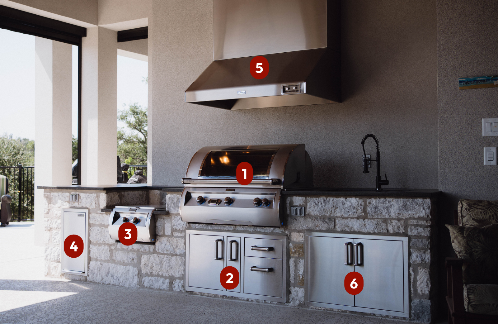 Fire Magic Outdoor Kitchen with Built-In Gas Grill, Power Burner, and Vent Hood in San Antonio, TX with Cozy Fireplace + Patio