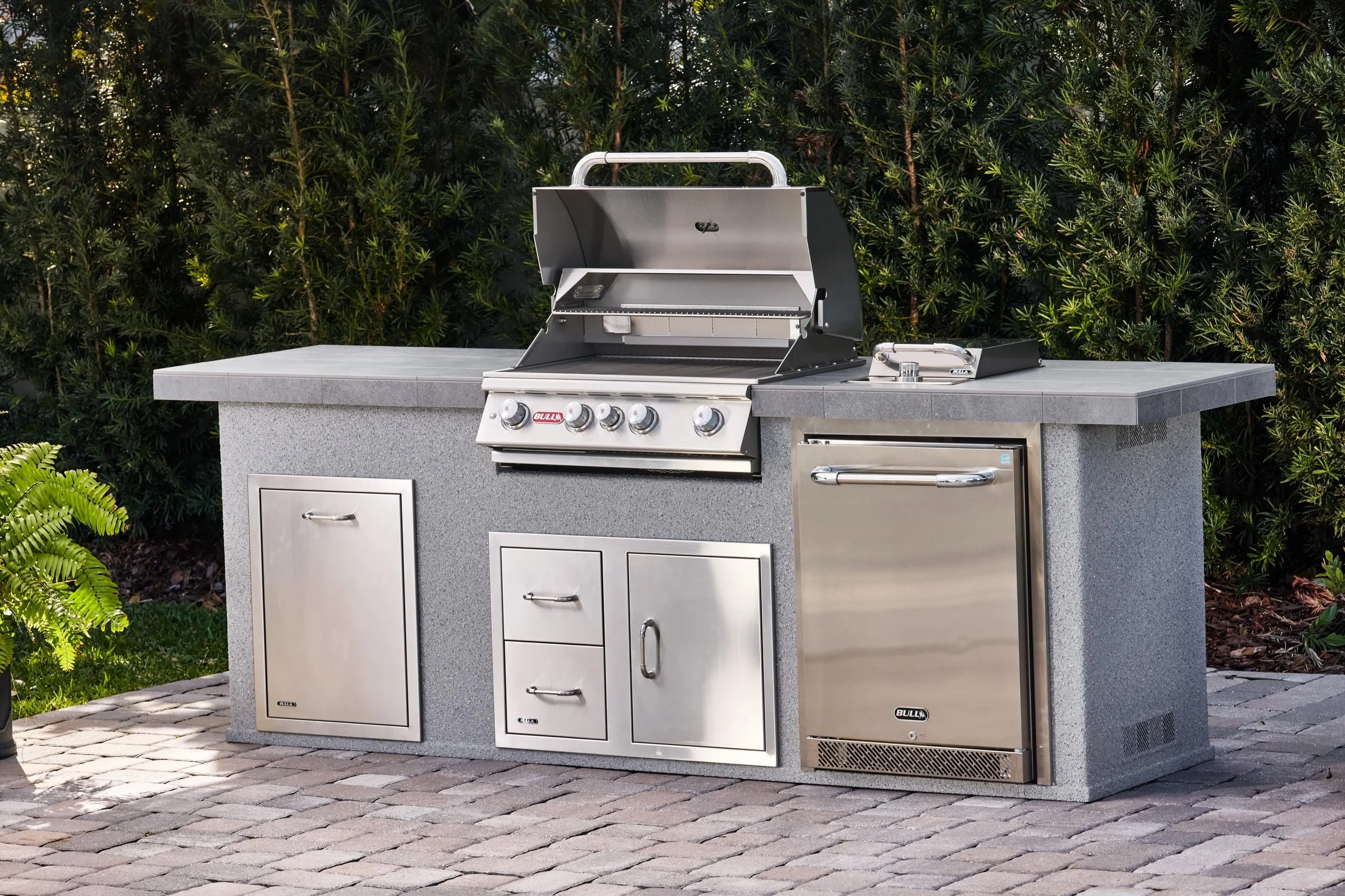bull bbq grills and installation by outdoor fireplace experts Cozy Fireplace + Patio in San Antonio, Texas