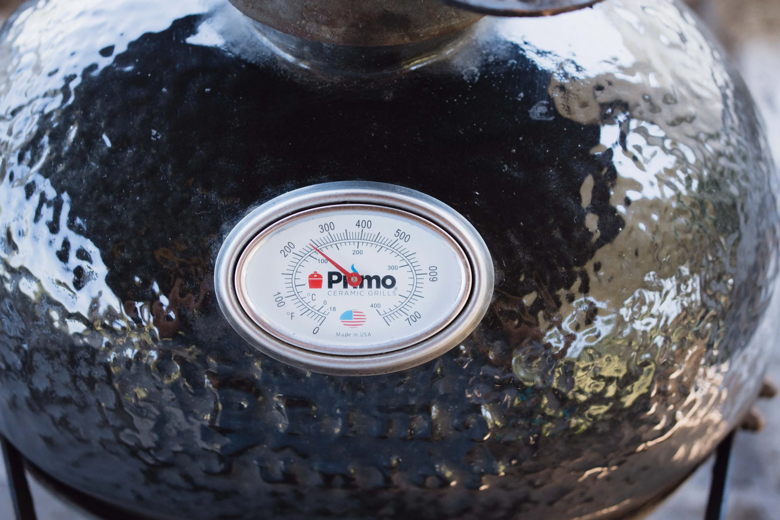 Primo ceramic charcoal grill in a custom outdoor kitchen by Cozy Fireplace + Patio, San Antonio