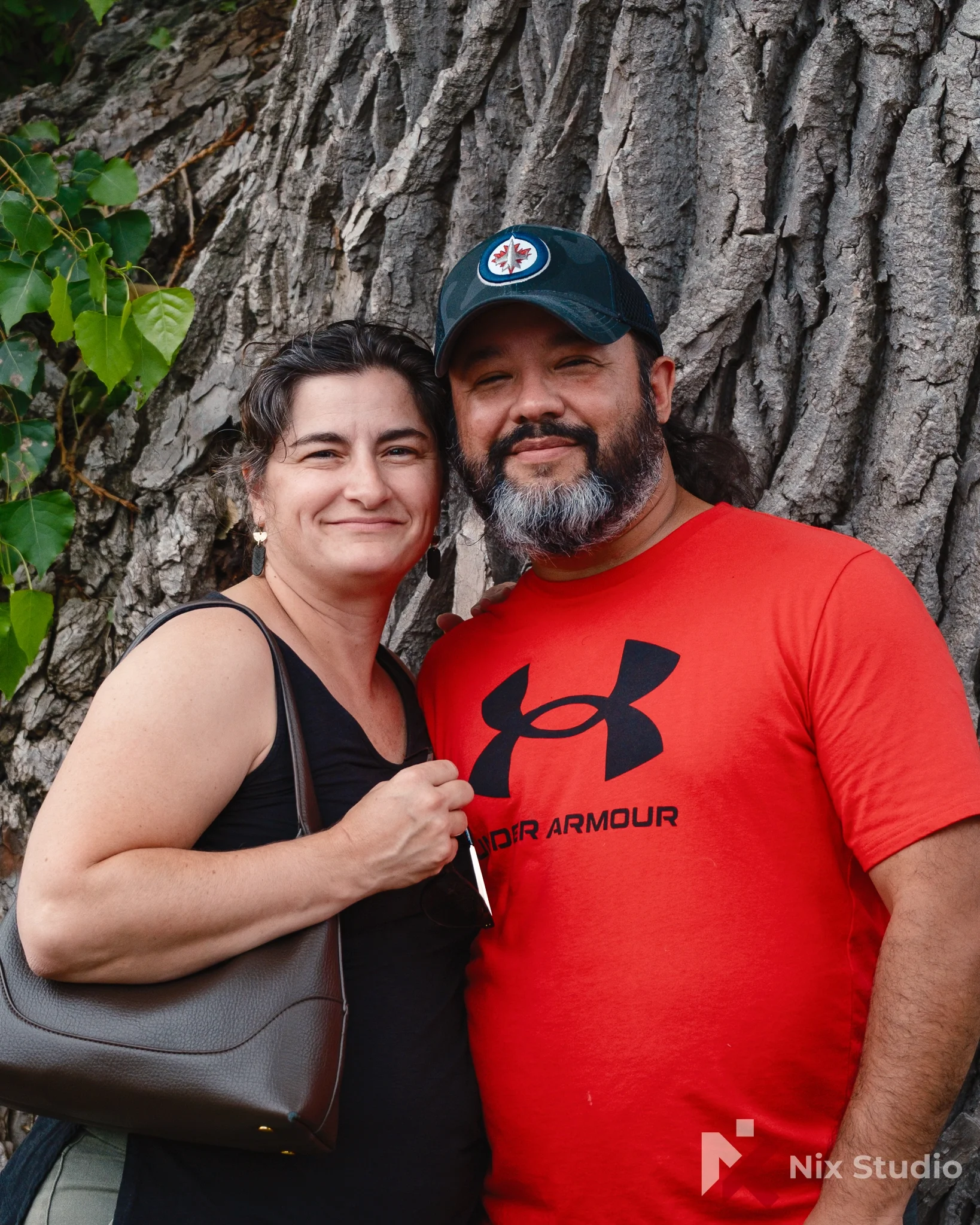 Couple in Morden park under a tree, Morden, Mb