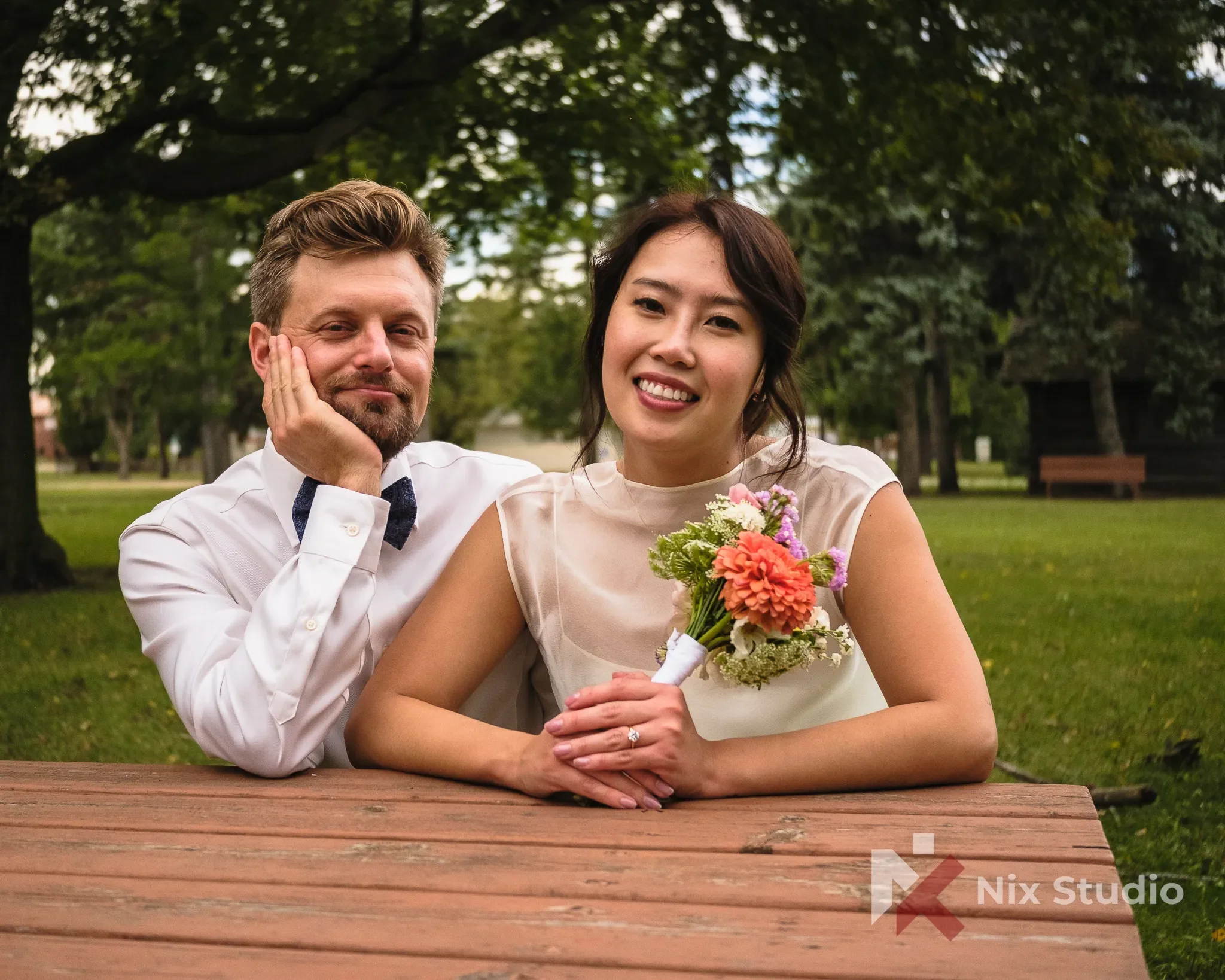 Portrait of a newlywed couple captured by Dunixi Larrauri in Morden Manitoba