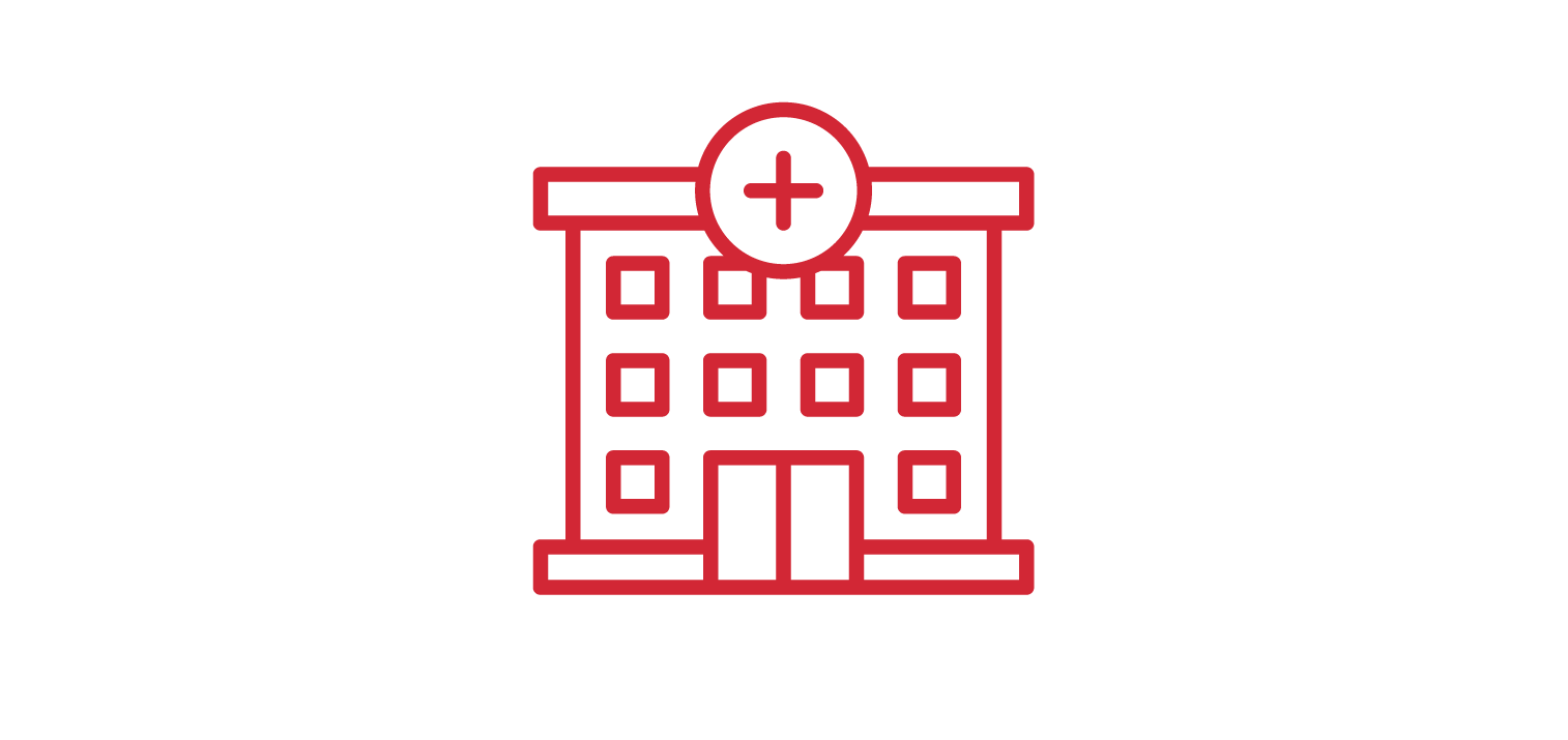 Outline of a hospital building with a plus sign above the entrance, in red.