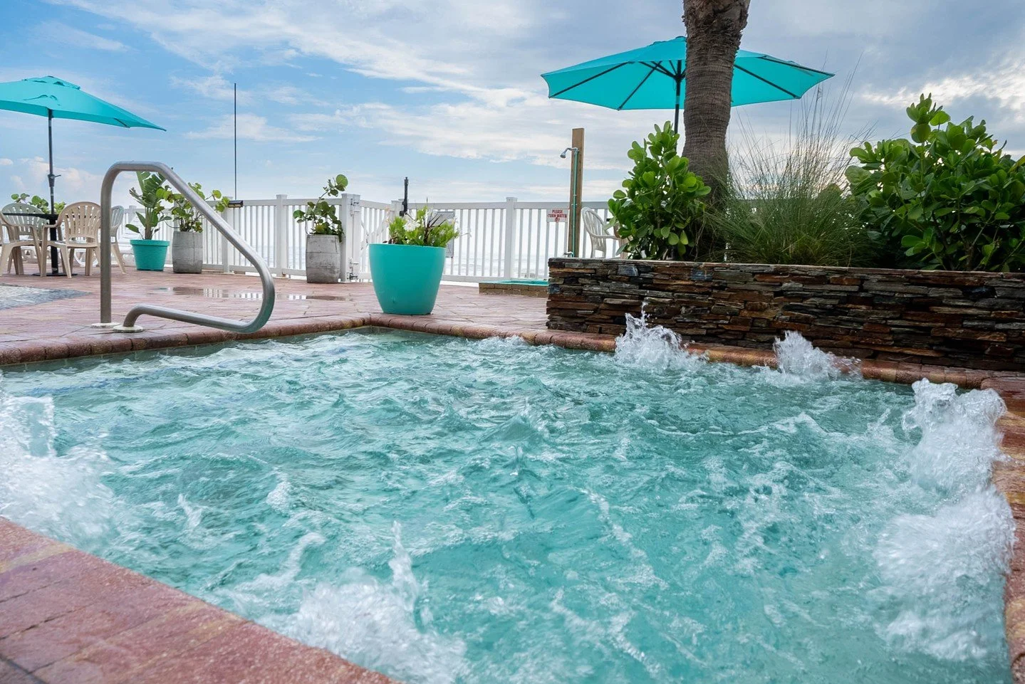 Fall in love with the coast 🍂🌊 Cozy up this season in our heated oceanfront pool or soak in the hot tub with waves at your feet &mdash; our way of keeping things warm and relaxing for fall. Book your stay today: www.boardwalkhoteldaytonabeach.com 
