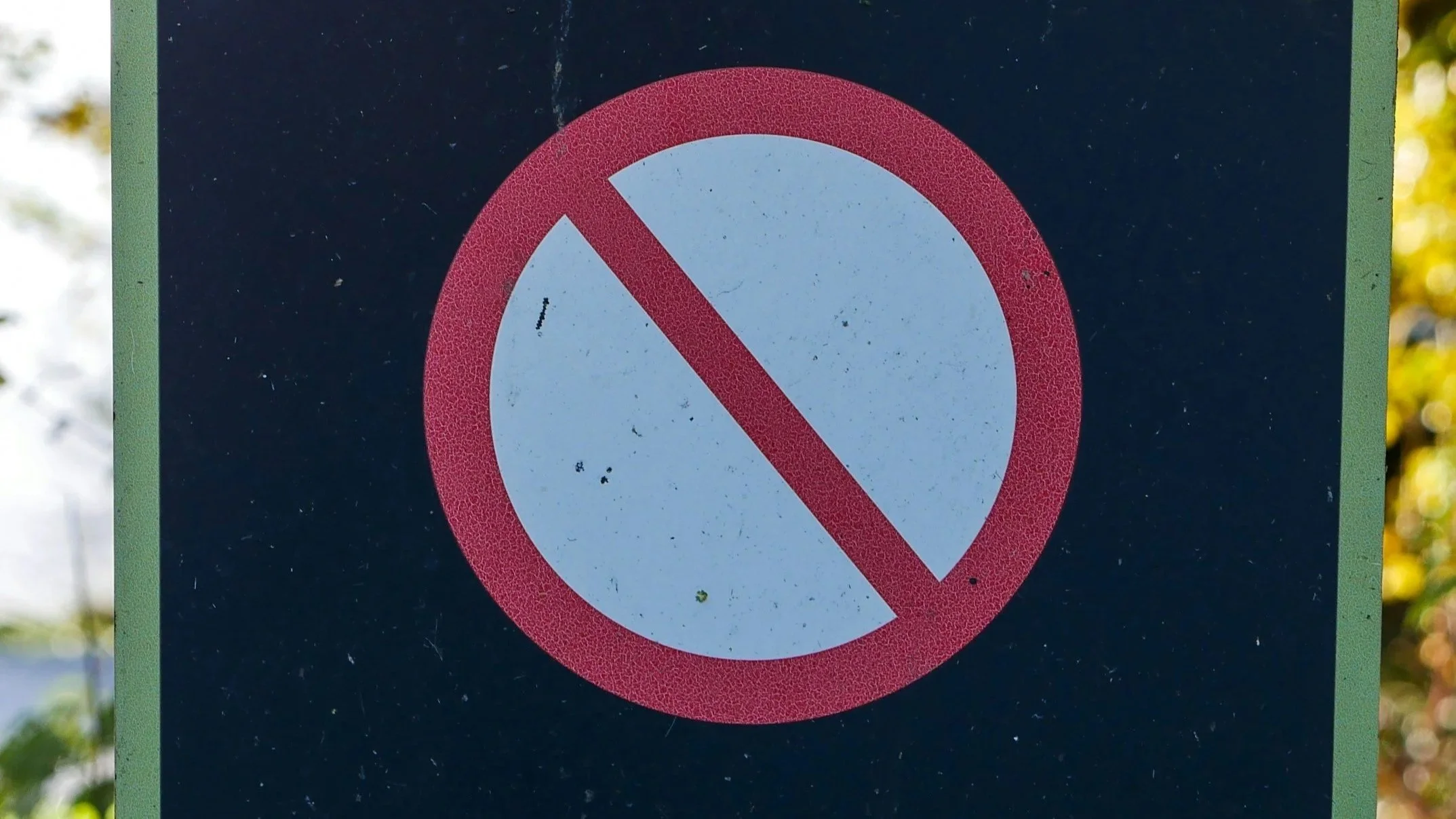 A no sign with a black background.