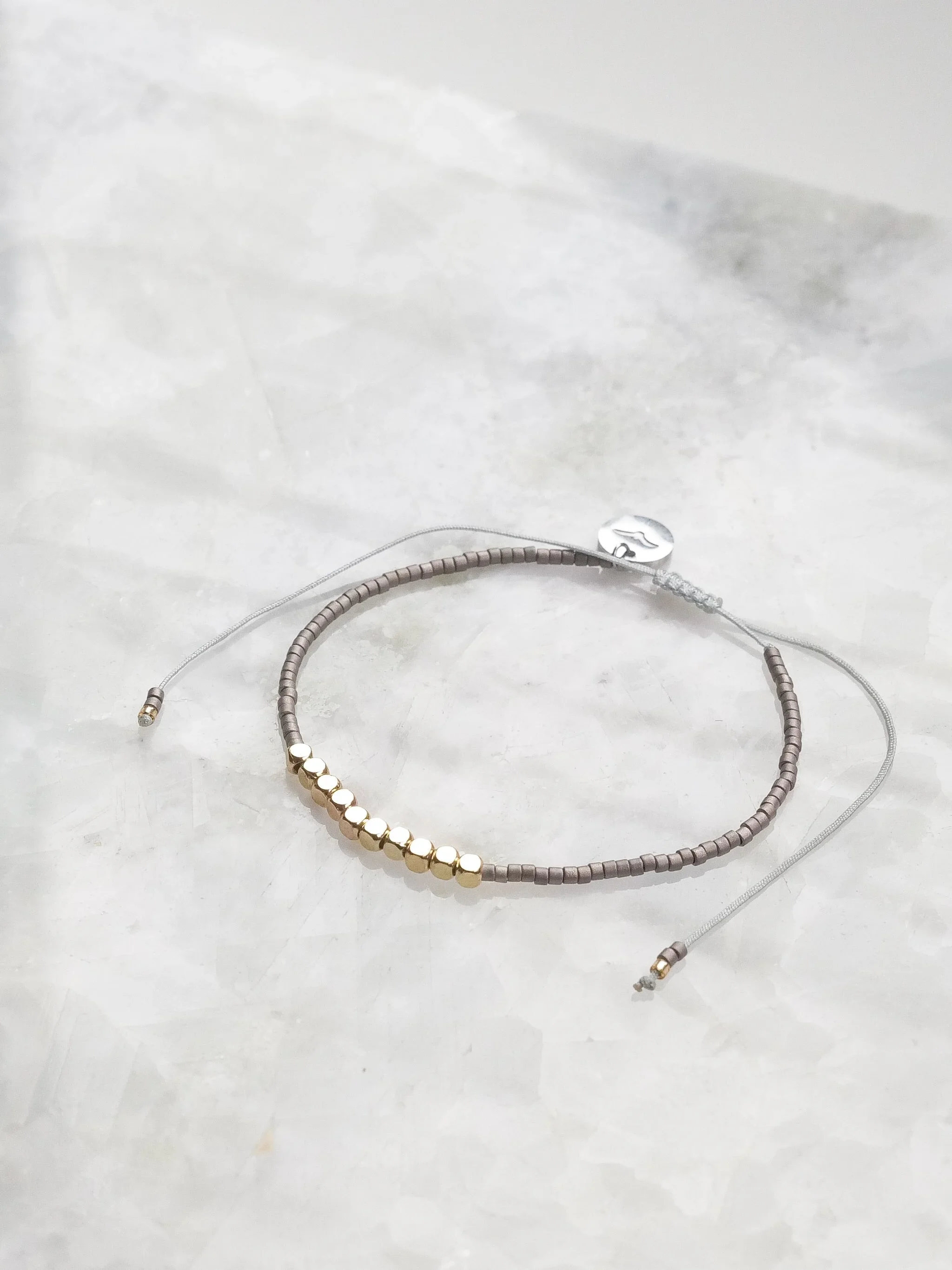 Golden+Island+Bead+-+Grey.webp