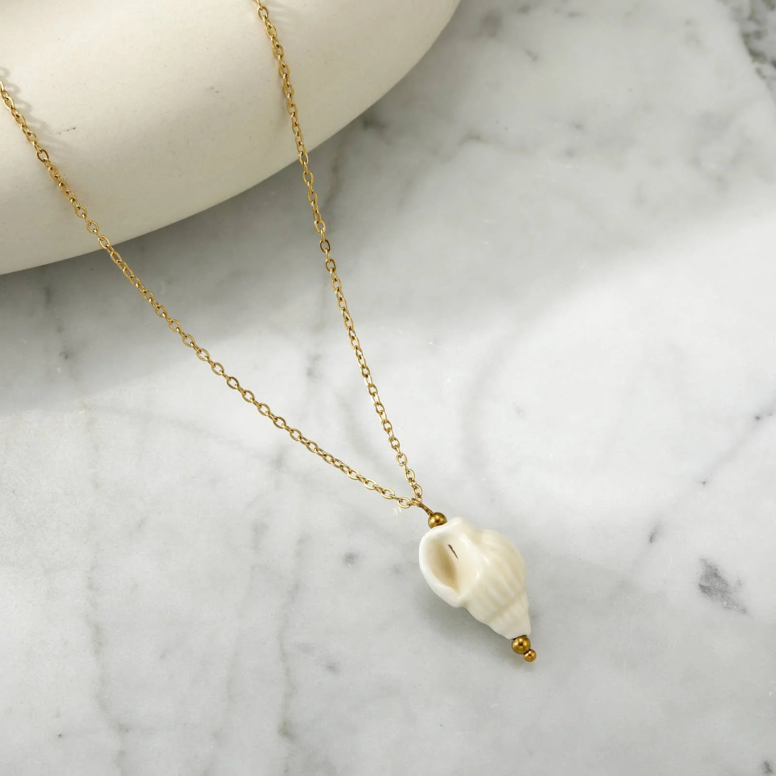 ceramic-conch-shell-necklace-1.jpg