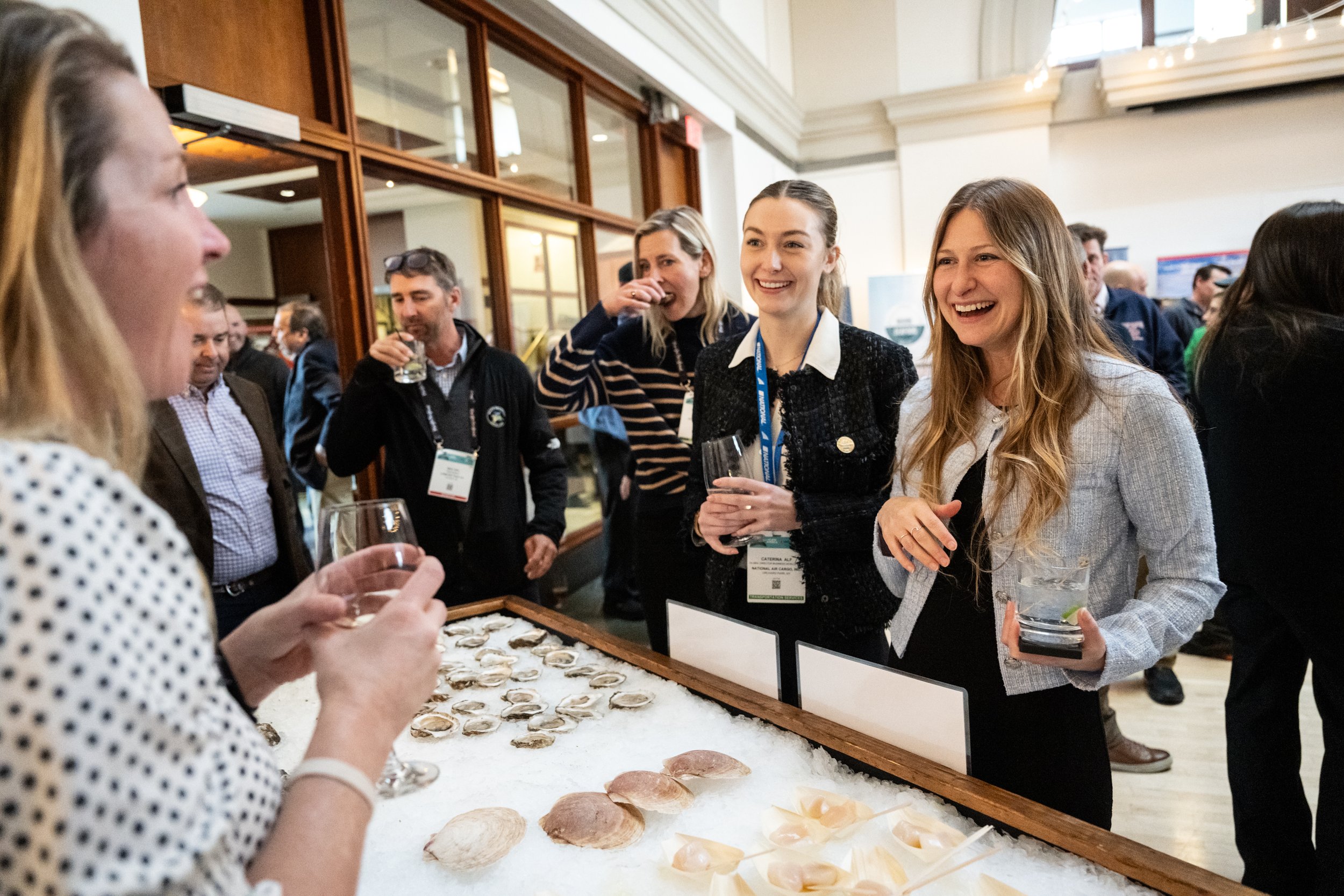 Heather Moretti and women around Dayboat scallops.jpg
