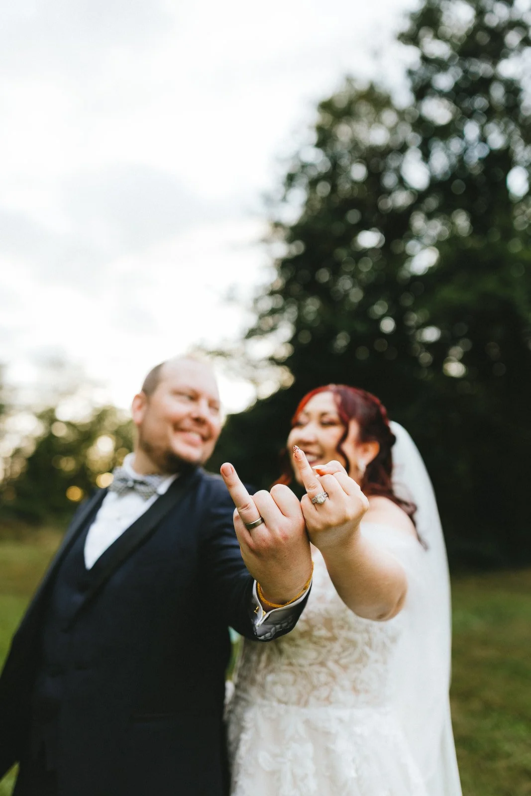 Jenn and Andrew laughing and having fun during wedding portrait session, candid documentary wedding photography