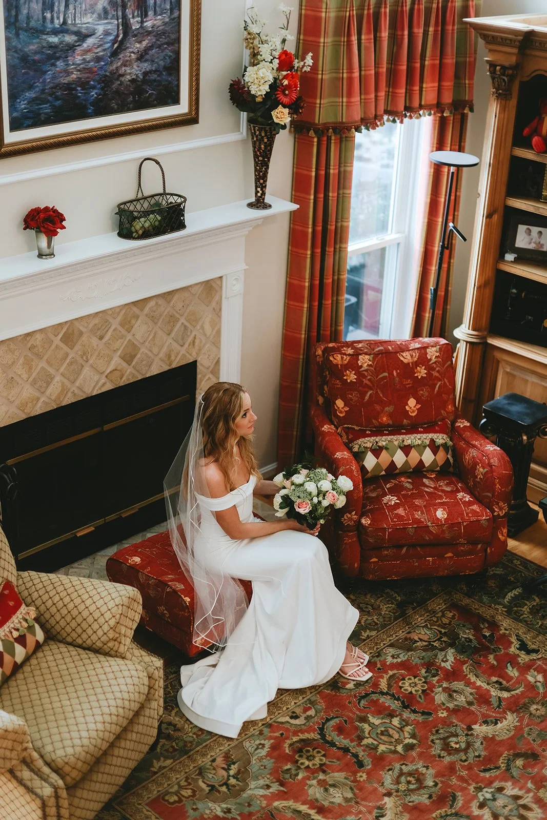 allison-bride-sitting-fireplace-getting-ready-indoor.jpg