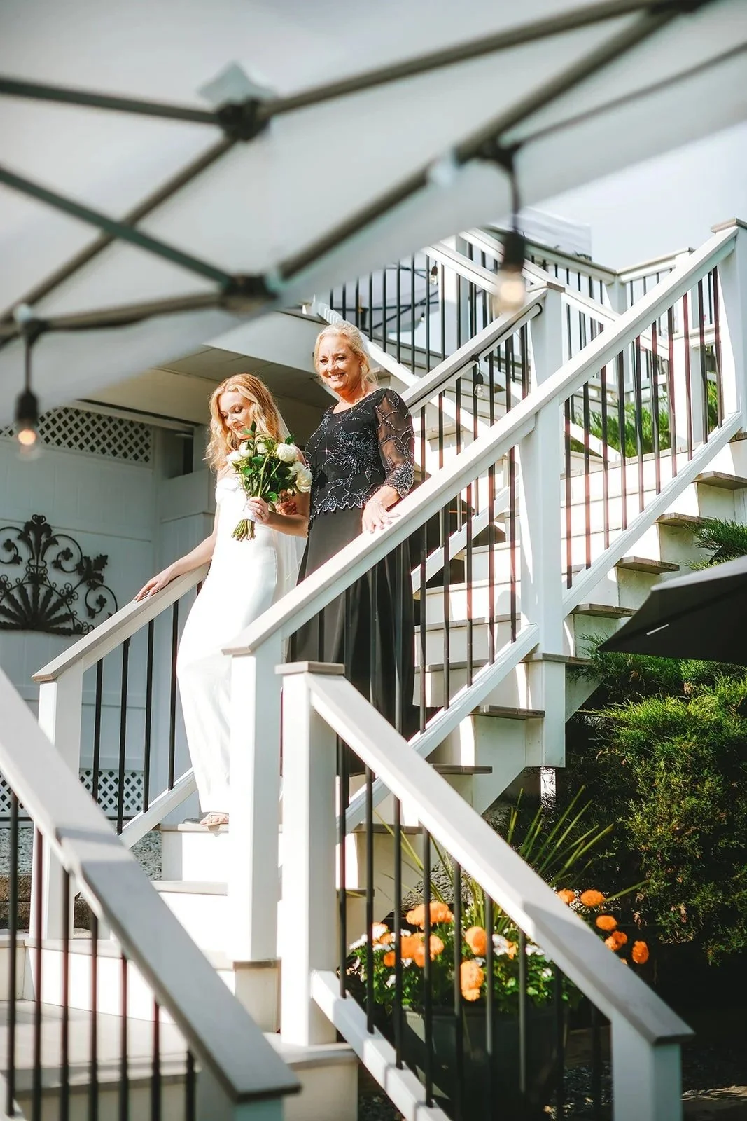 allison-bride-outdoor-staircase-backyard-wedding.jpg
