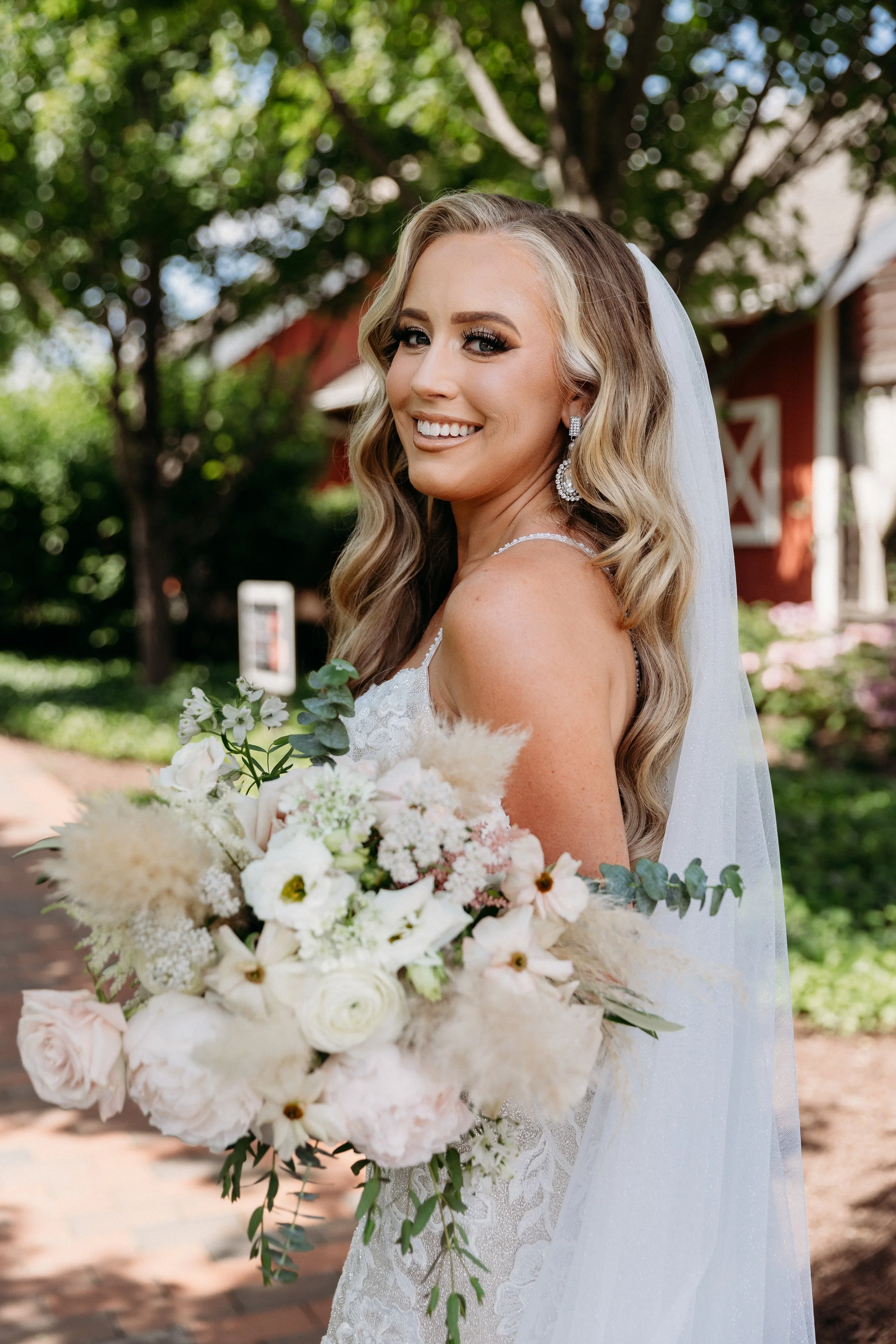 bride holds flower