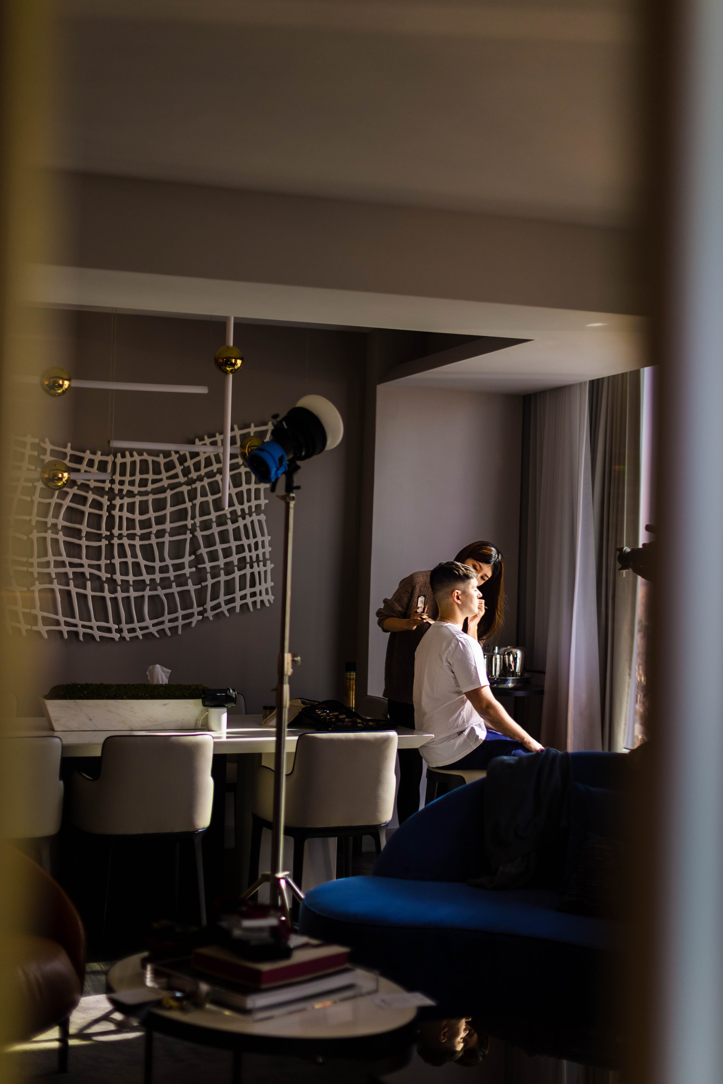 groom getting ready in room