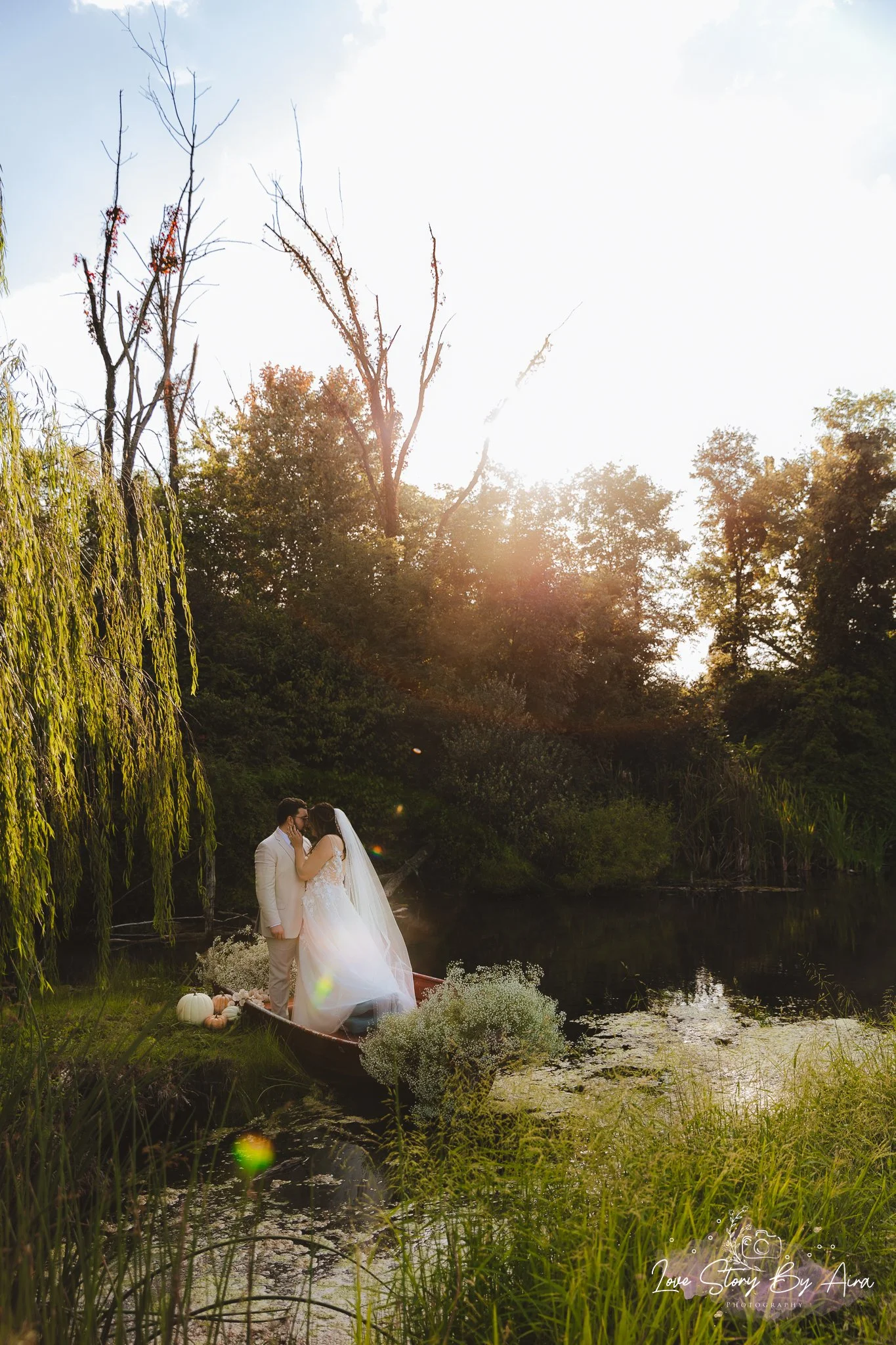 Bride and groom sharing a quiet moment by the lake during golden hour, outdoor Maryland wedding photography by Love Story By Aira