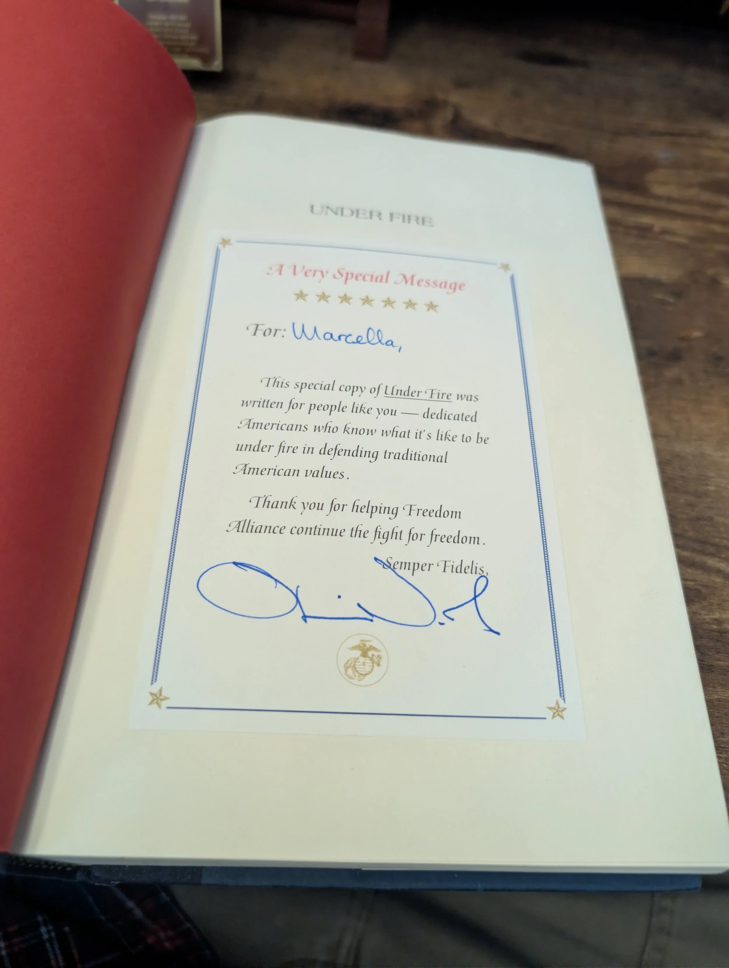 oliver north signature - under fire - first edition