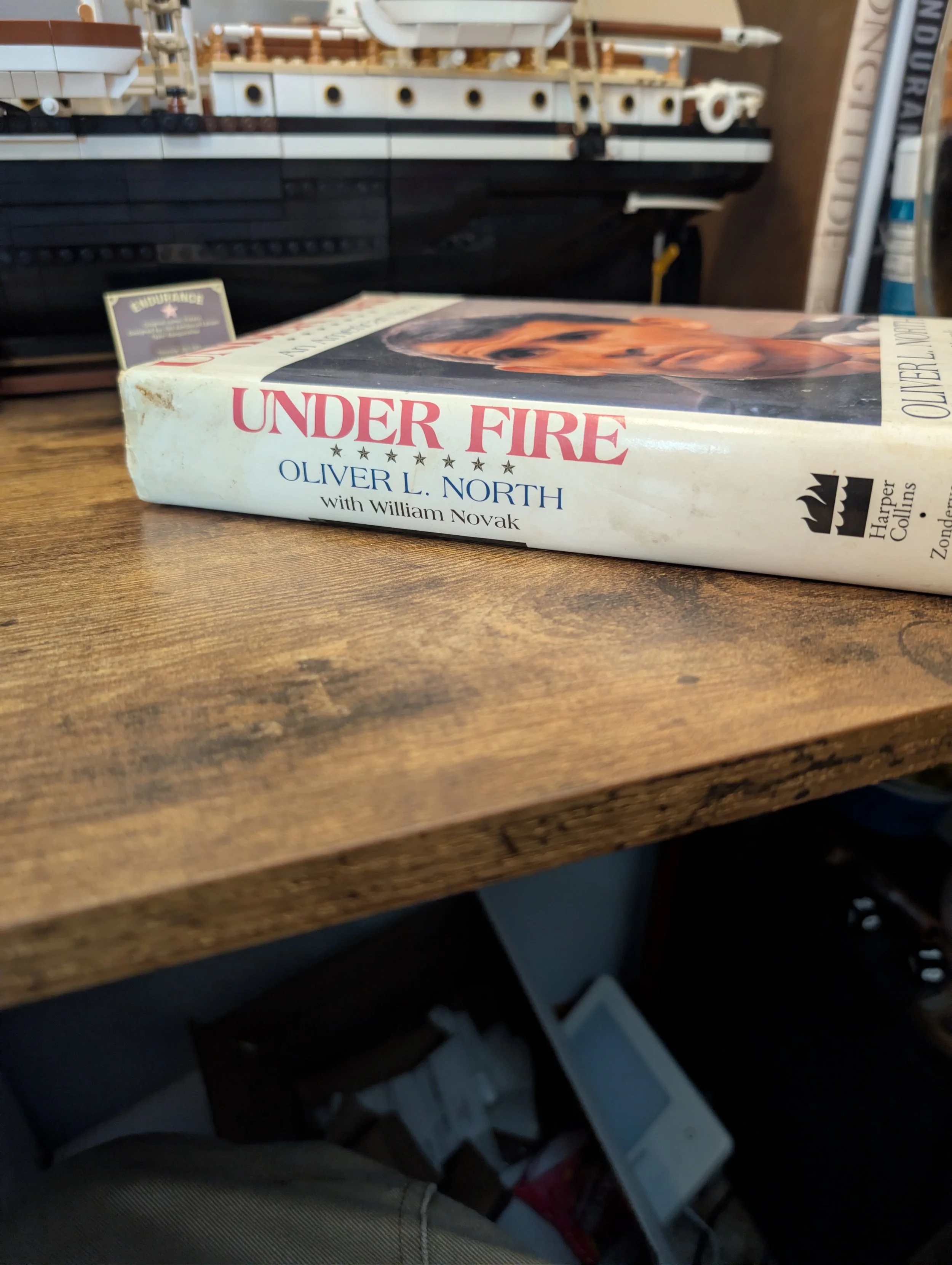 spine - under fire - oliver north.jpg