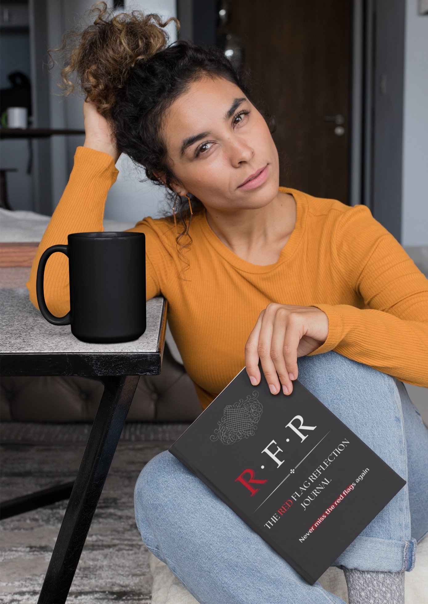 mockup-of-a-serious-woman-holding-a-book-while-drinking-from-a-coffee-mug-28475.jpg