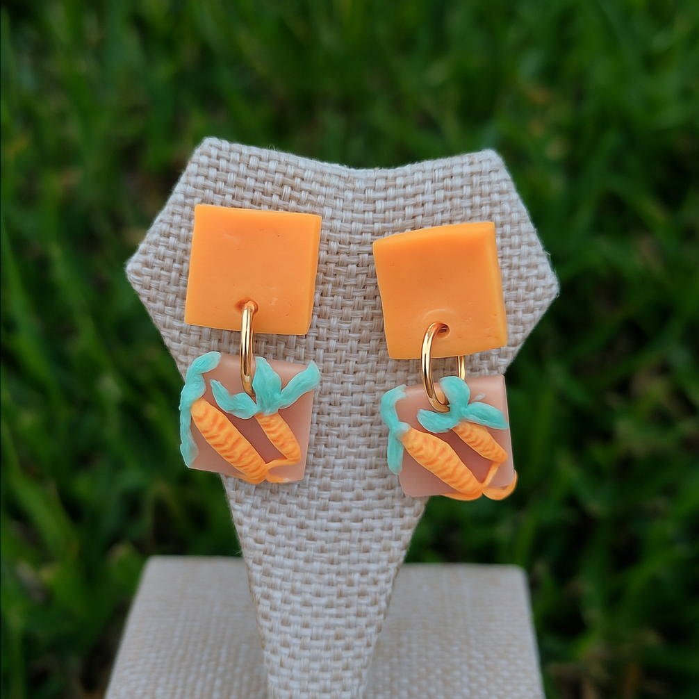 20251101_2220_Carrot+Earrings+Display_remix_01k8znphjyenna73m24m8bfgf2.png