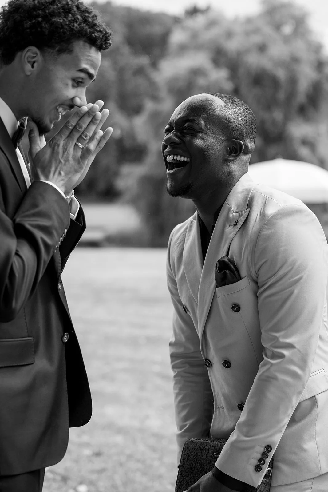 Fábio&amp;Jules_groom-wedding-laughter-reception.jpg