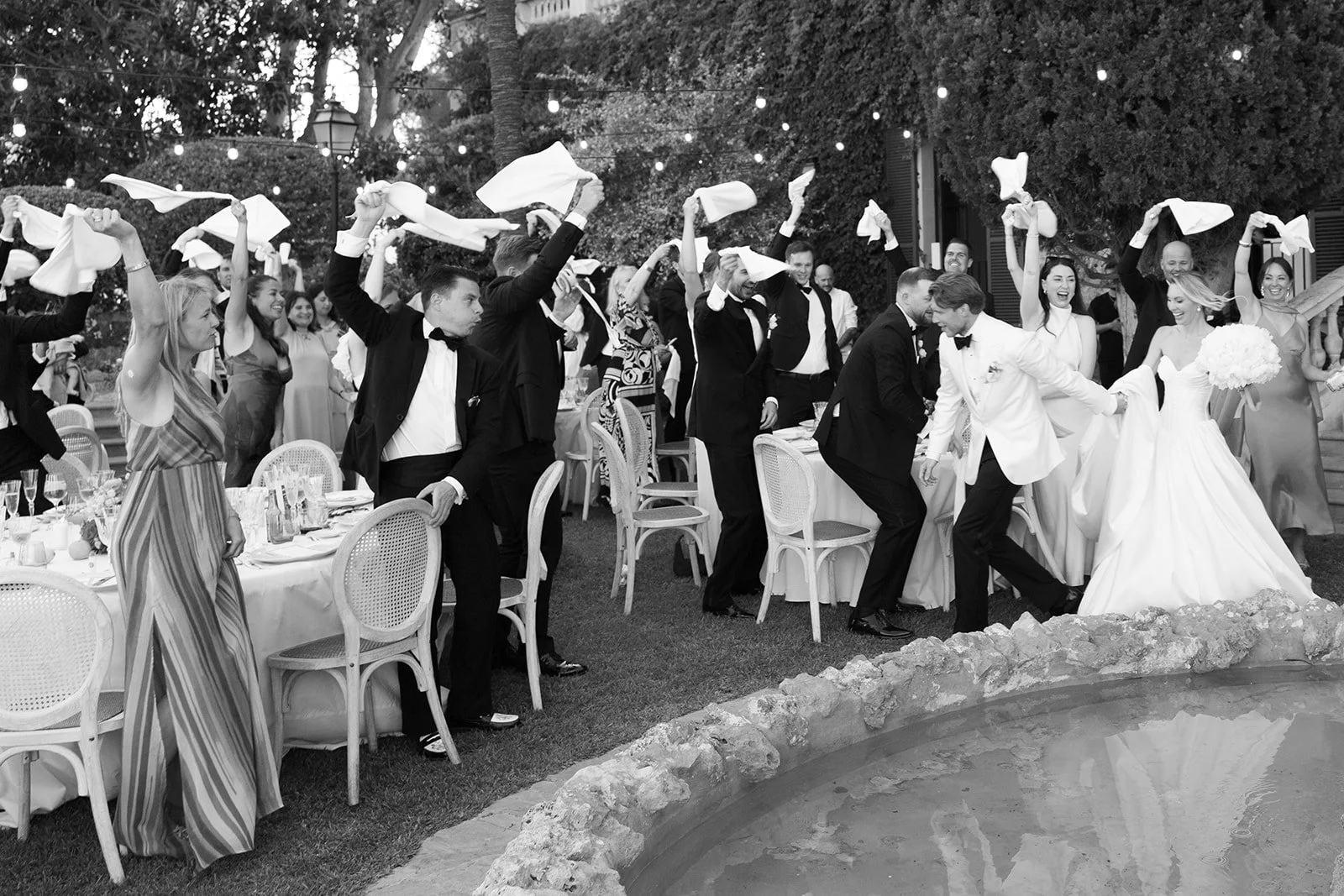 Wedding guests celebrate bride and groom during wedding dinner at Son Togores Mallorca