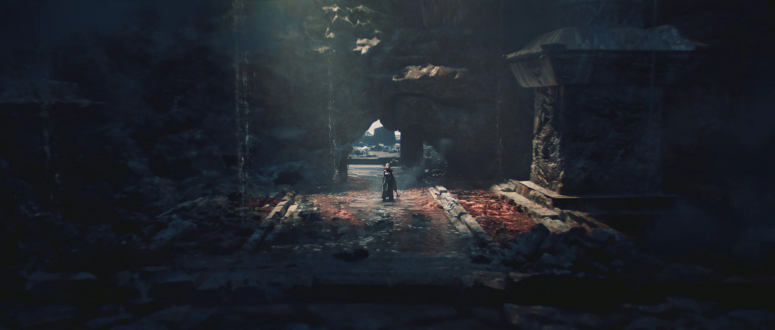 A person walking through a dark, abandoned tunnel with rubble on the ground.