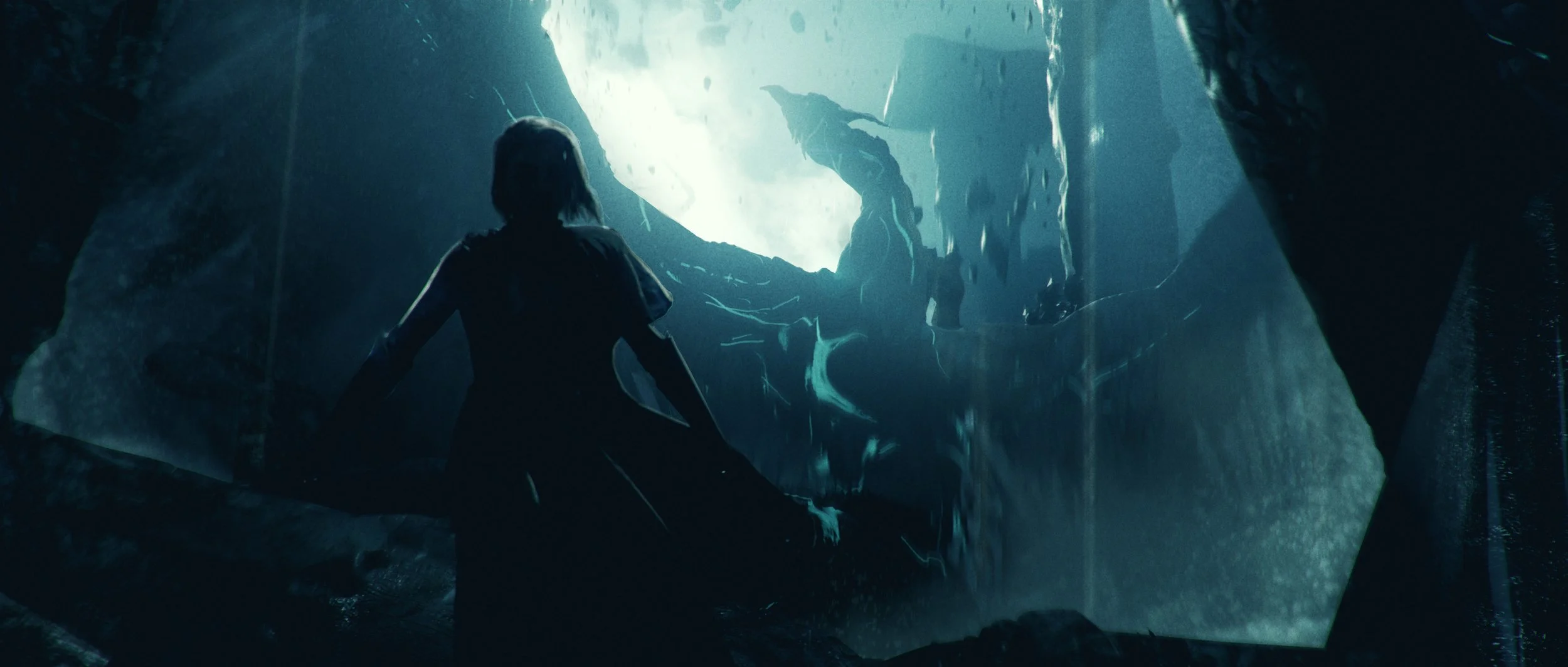 A person gazing at a large, mysterious aquatic creature inside a dark cave or underwater environment.
