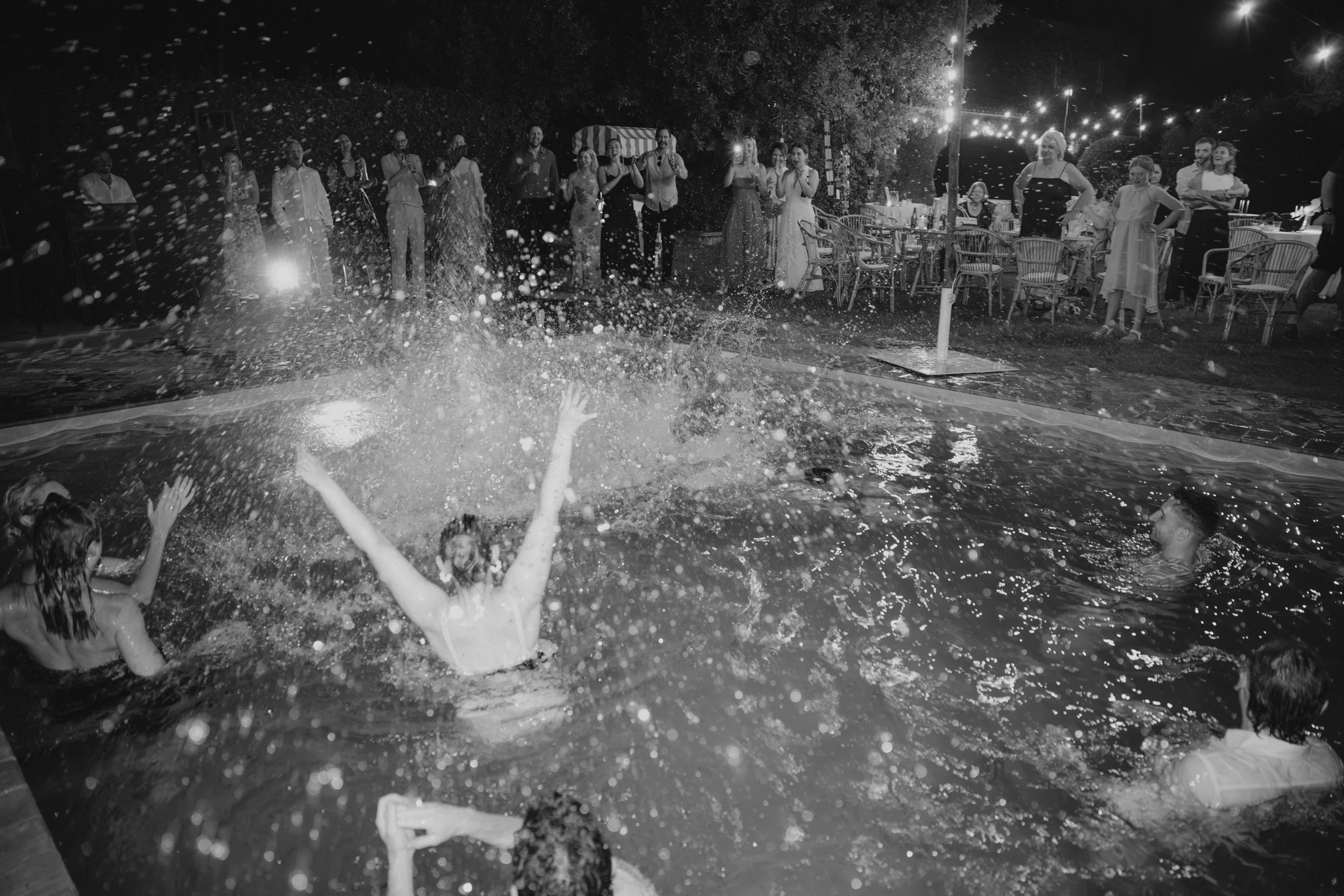Selina, Jamie and their guests dancing, enjoying ice cream and jumping into the pool at Casale del Gallo during a relaxed Italian summer wedding party.
