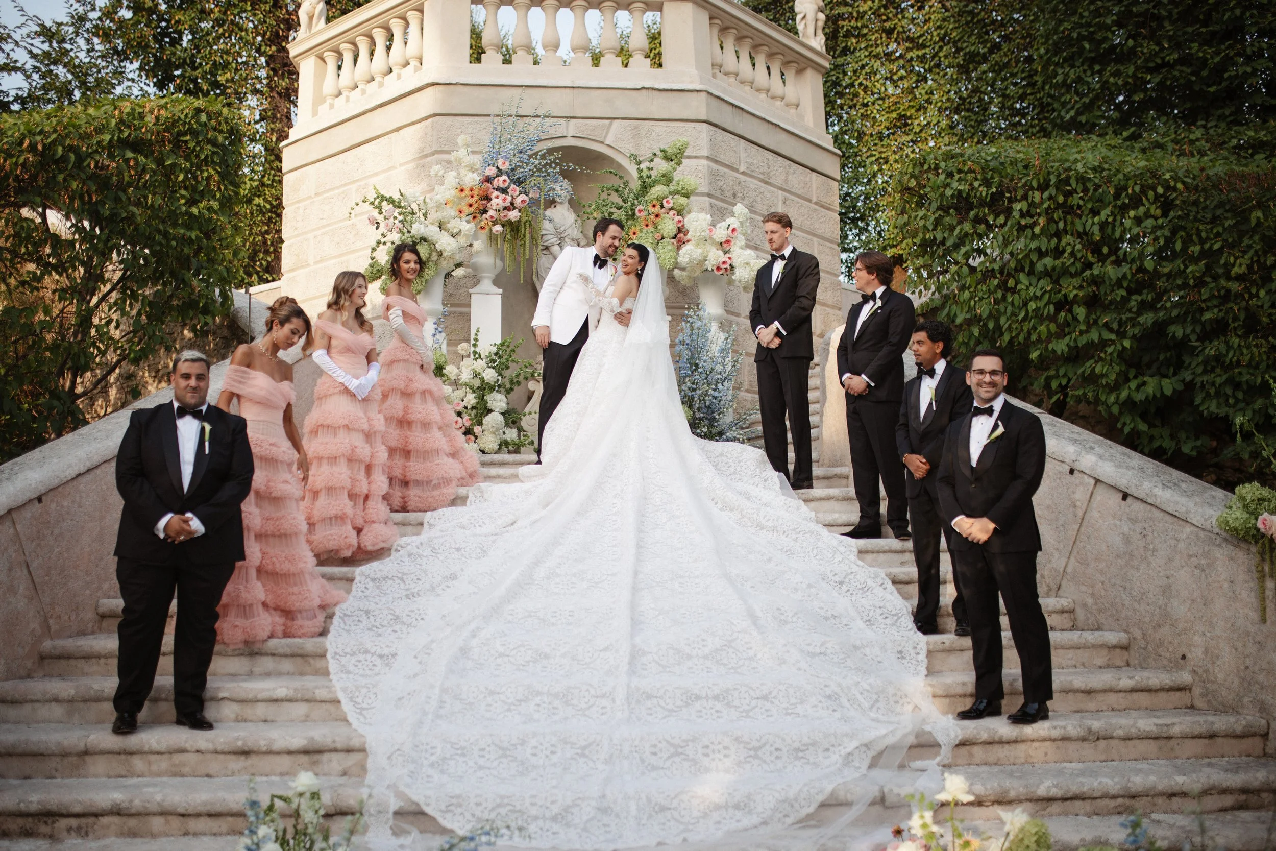 Luxury wedding ceremony in the historic gardens of Villa Rizzardi in Verona, with elegant floral styling, white details and a sophisticated Italian garden setting.