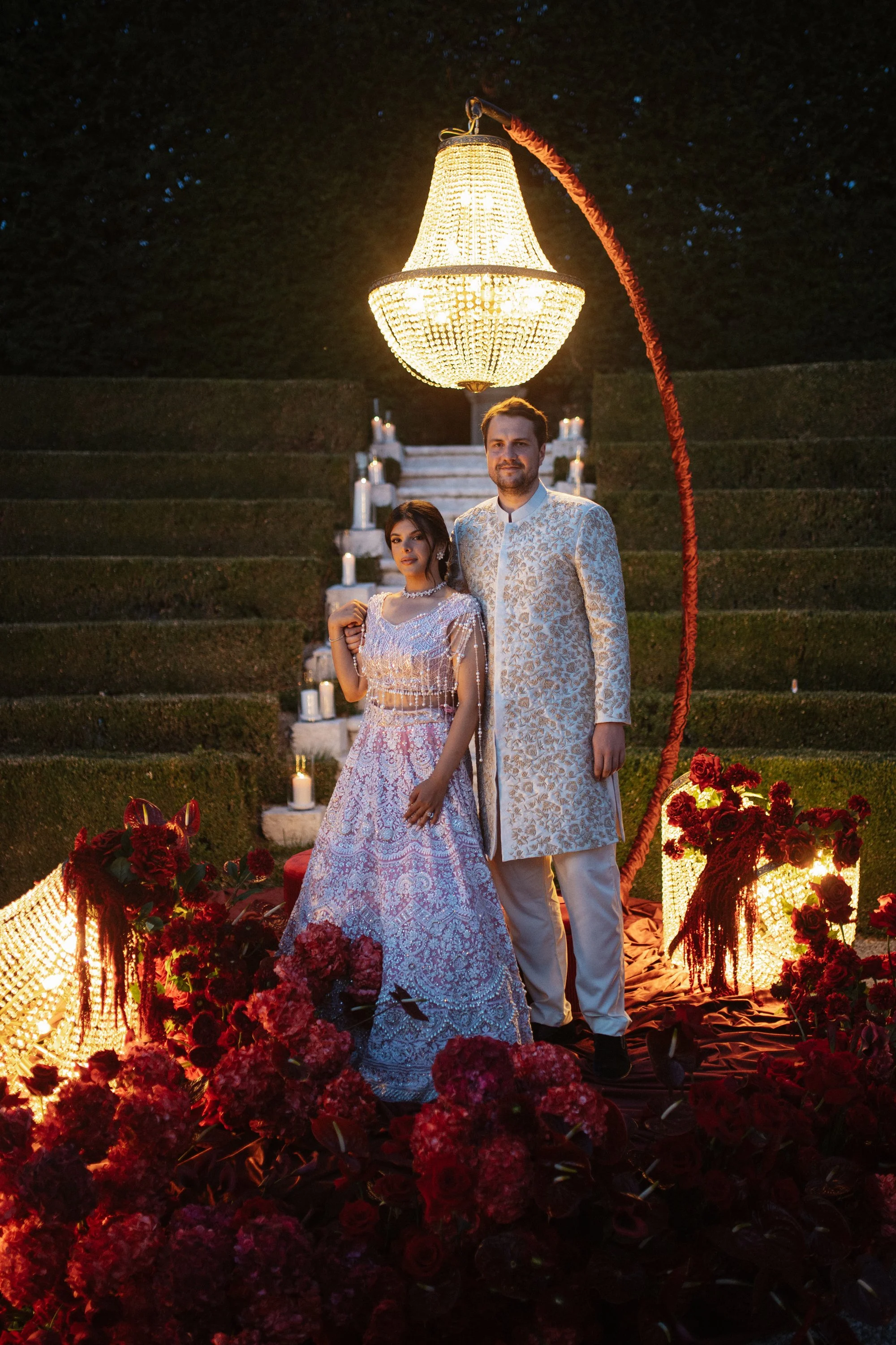 Pakistani wedding celebration in Verona at Villa Rizzardi, featuring traditional clothing, rich red and gold details, music and an elegant cultural setting.