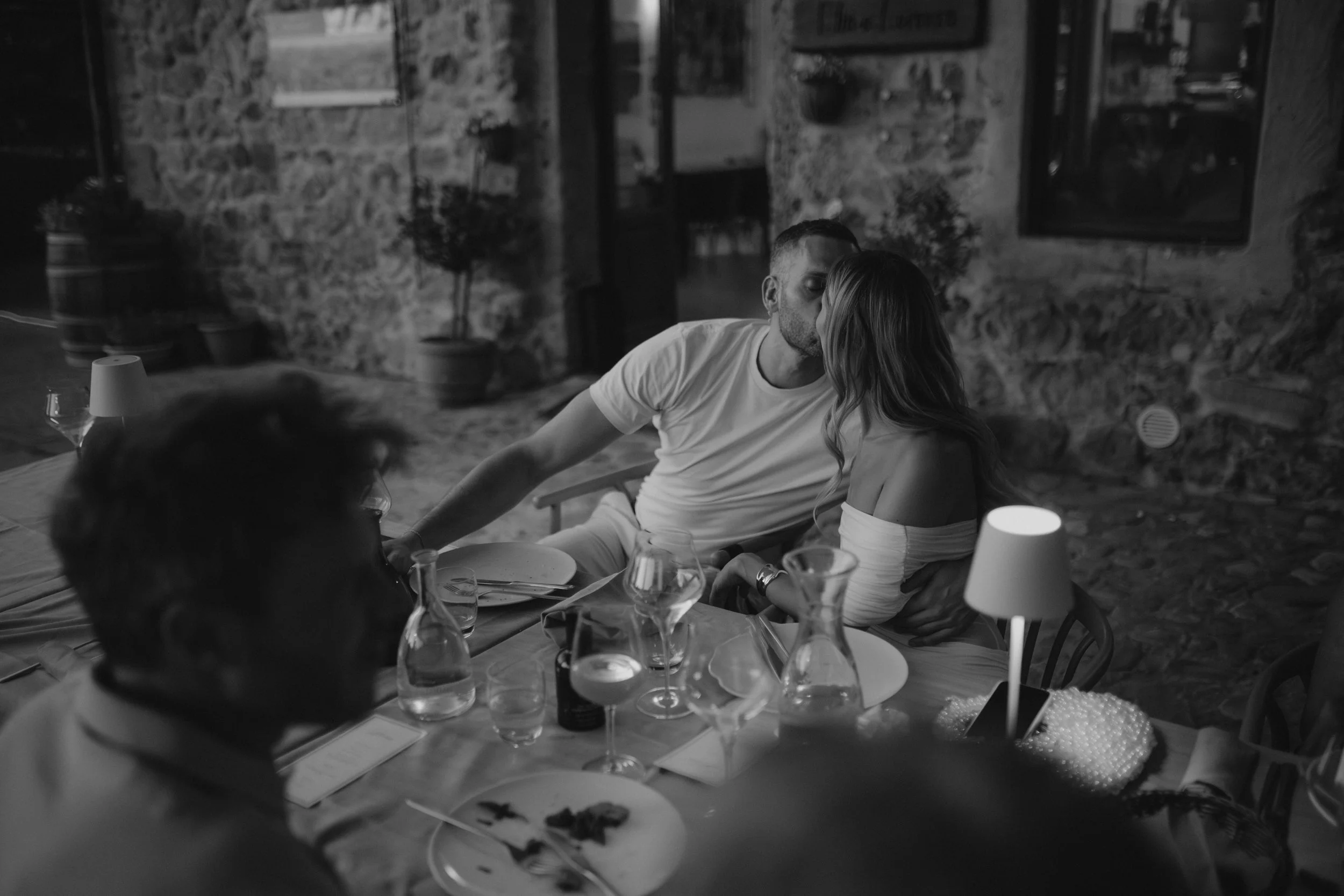 Welcome Dinner in Tuscany at Ristorante La Dispensa in Pomarance, Italy, with an intimate group of friends and family enjoying a relaxed Italian evening.