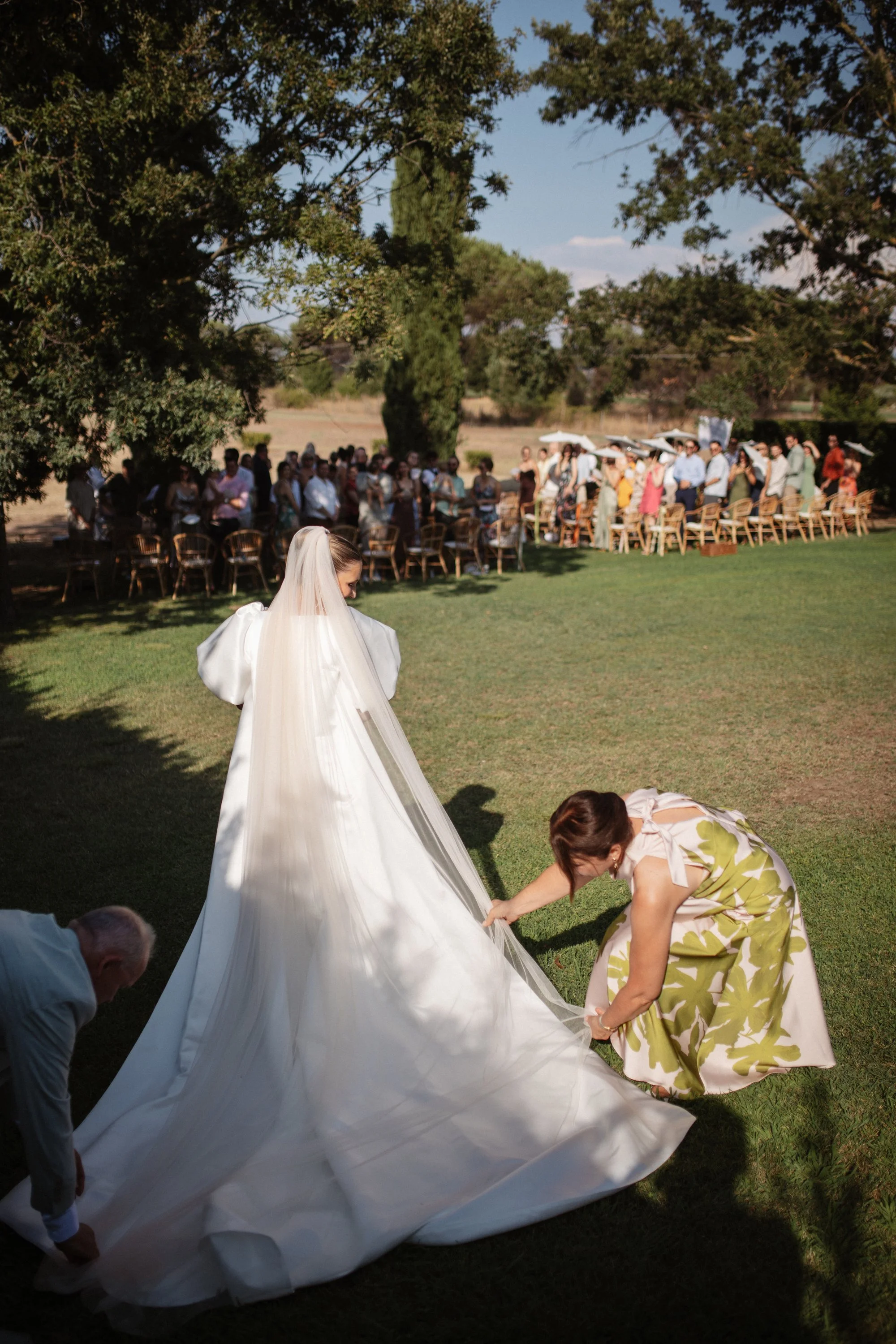 Elegant outdoor wedding ceremony at Casale Sant’Antonio near Rome, with Selina and Jamie exchanging personal vows during their Italian destination wedding.