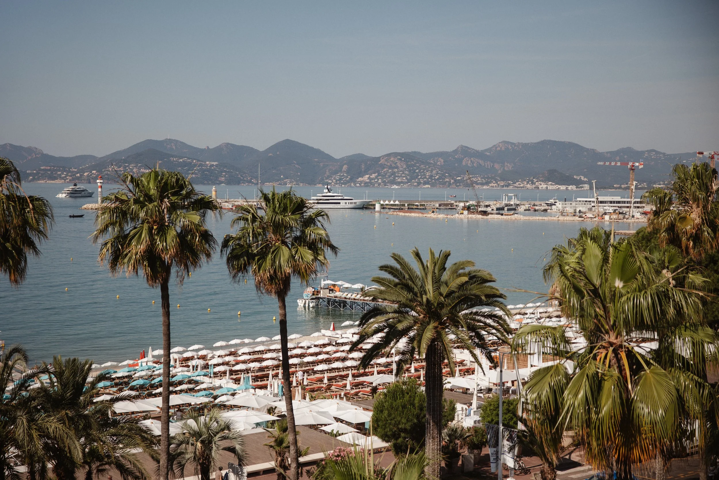 Luxury wedding getting ready at JW Marriott Cannes on the French Riviera, featuring the bride in her elegant Jarice Bridal gown, Christian Louboutin heels, refined bridal details, and a calm, modern wedding morning on the Côte d'Azur.