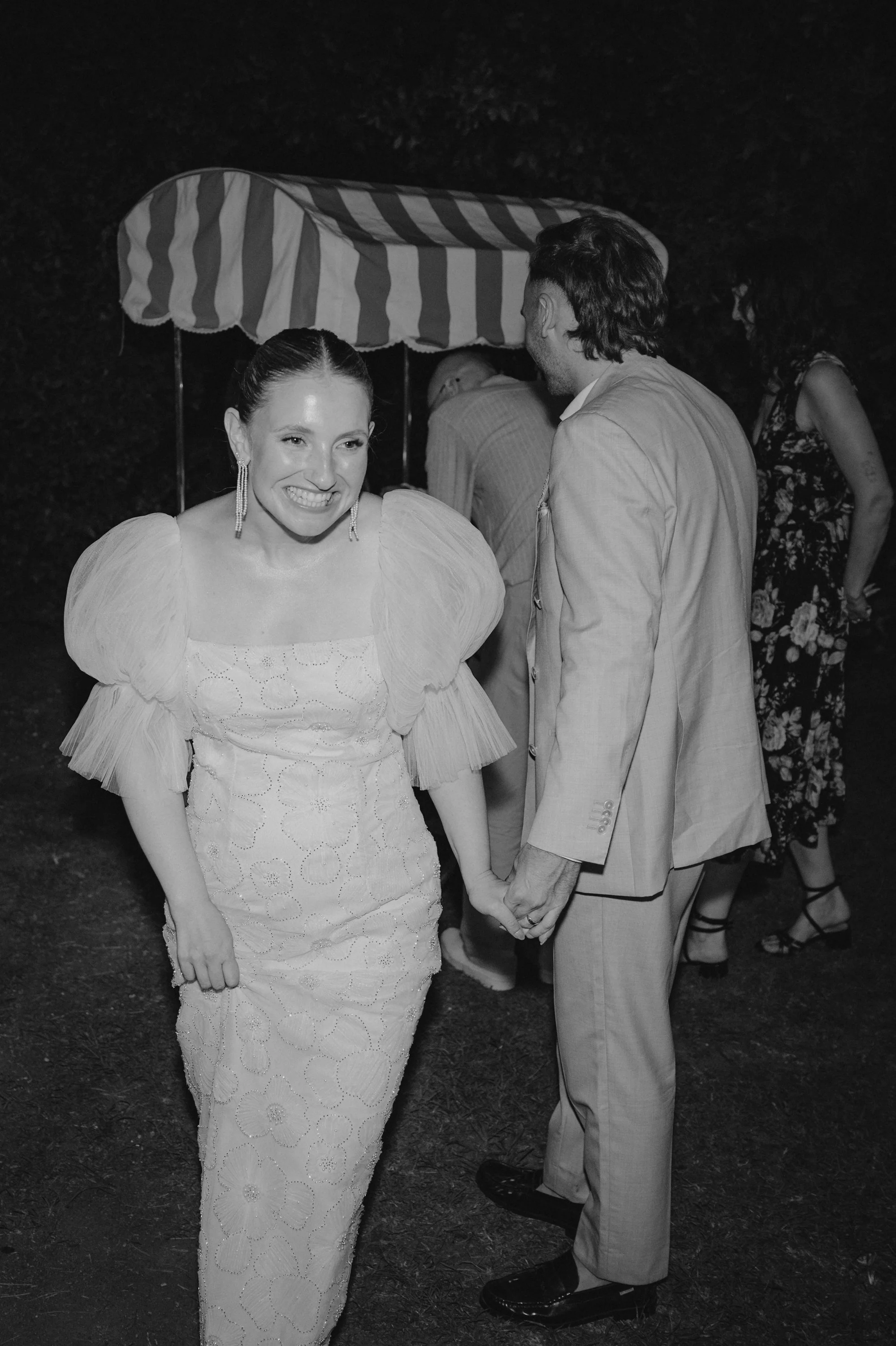 Selina, Jamie and their guests dancing, enjoying ice cream and jumping into the pool at Casale del Gallo during a relaxed Italian summer wedding party.