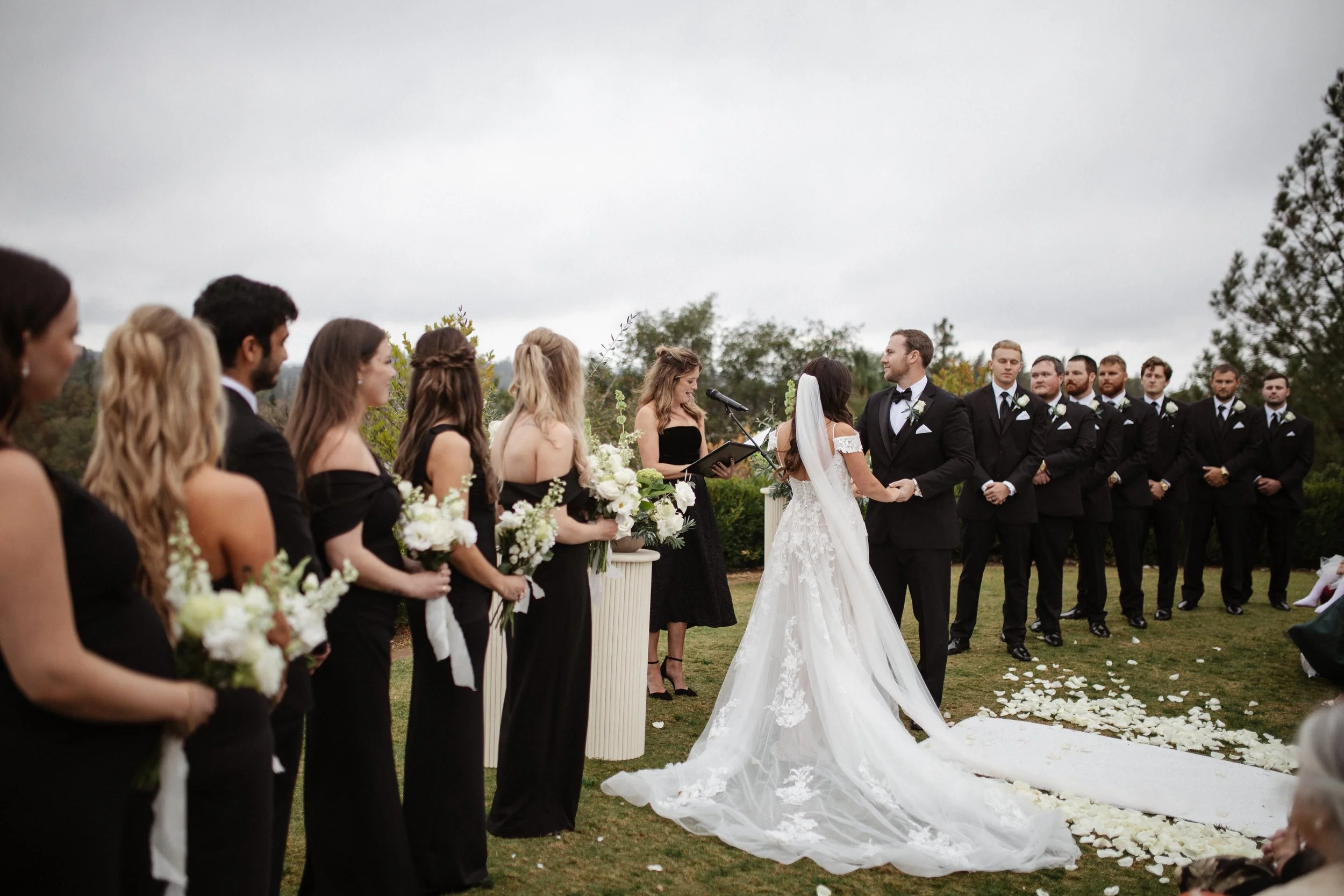 The outdoor ceremony was deeply personal and emotional. A close friend officiated the vows, making every word feel honest and heartfelt. The entrance of the bridal party, followed by Maya with her parents and Zack waiting quietly, created a powerful 