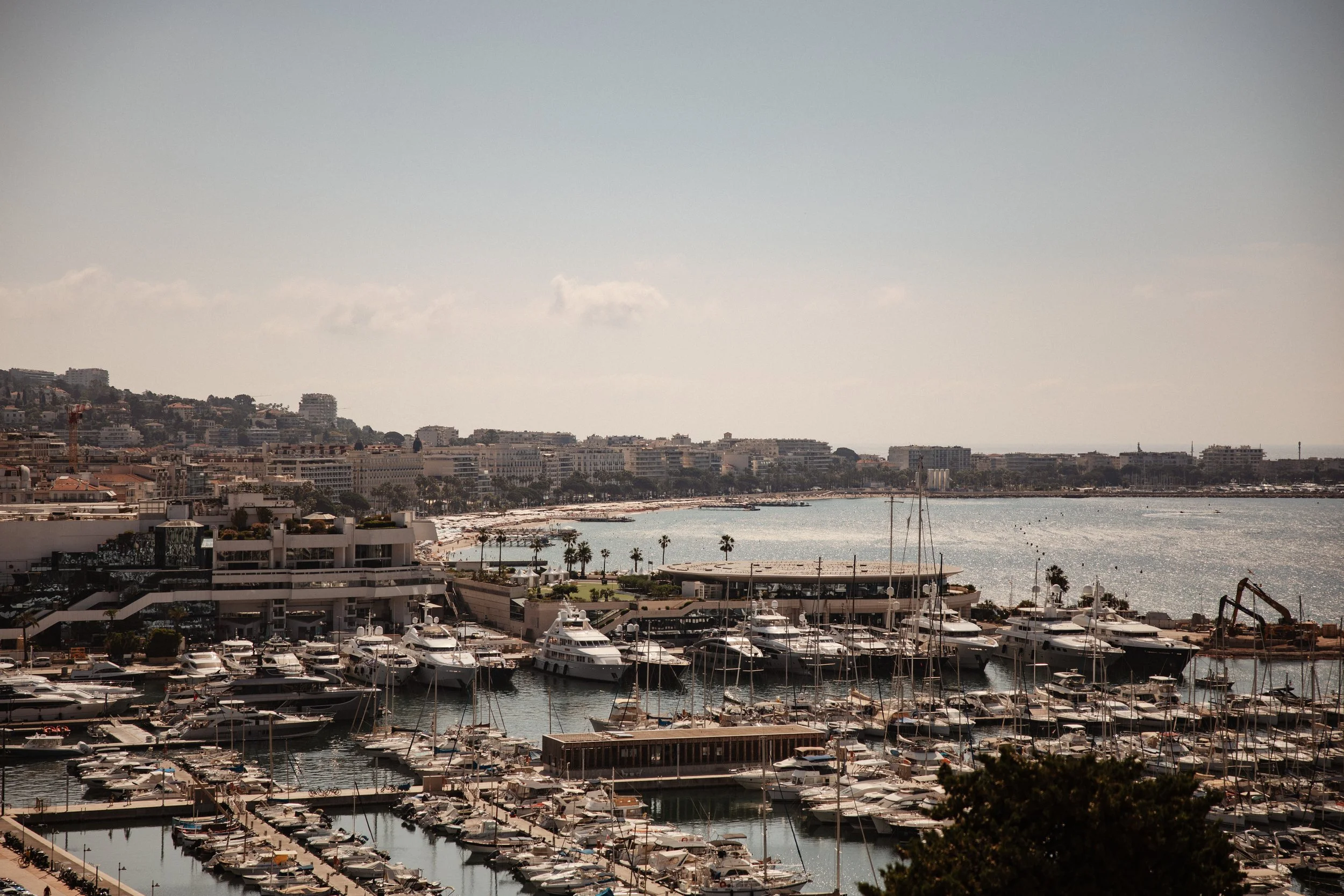 Luxury wedding getting ready at JW Marriott Cannes on the French Riviera, featuring the bride in her elegant Jarice Bridal gown, Christian Louboutin heels, refined bridal details, and a calm, modern wedding morning on the Côte d'Azur.