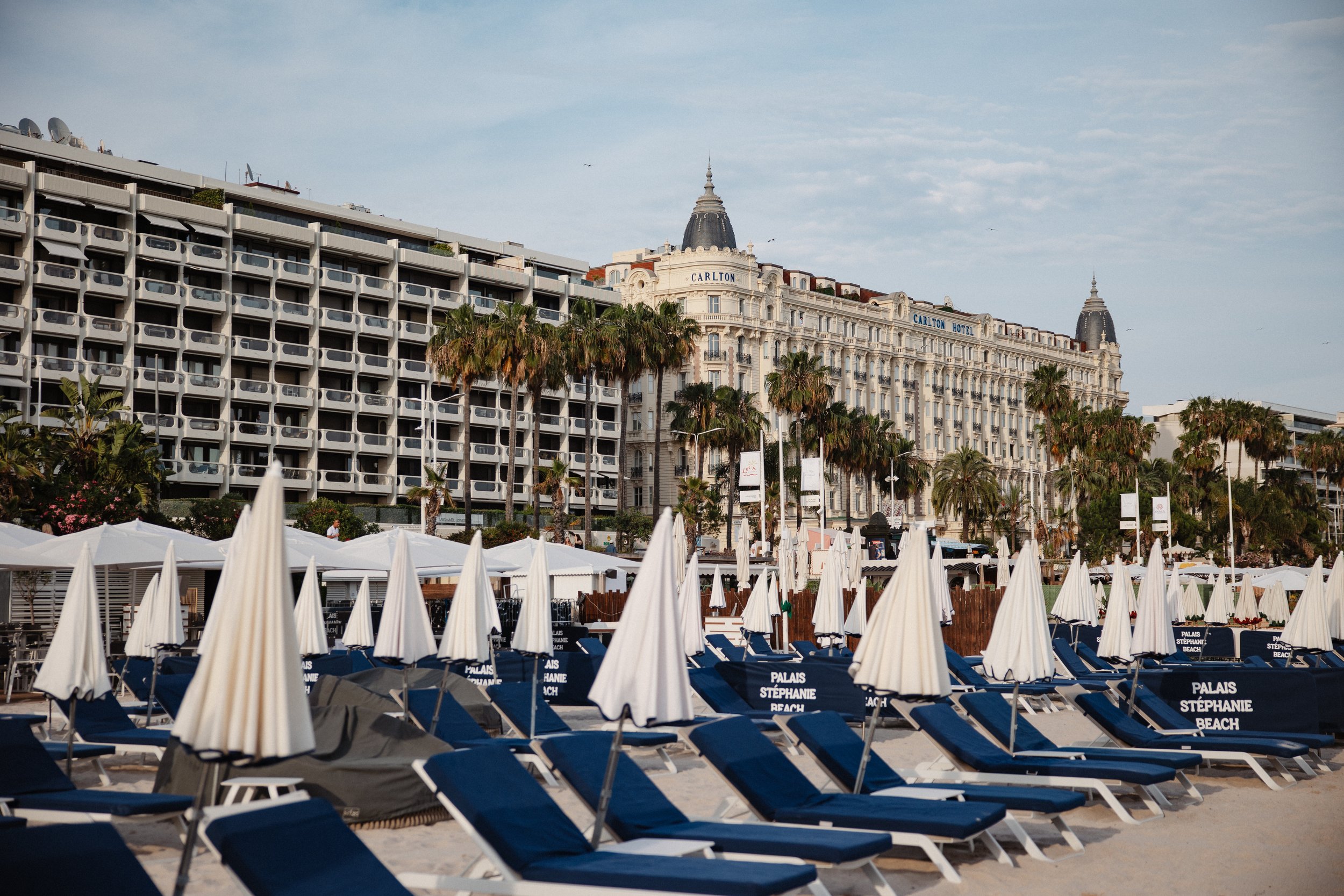 Luxury wedding dinner and reception by the Mediterranean Sea in Cannes, featuring elegant tablescape design, white florals, heartfelt speeches, candlelight, and an intimate celebration on the French Riviera.