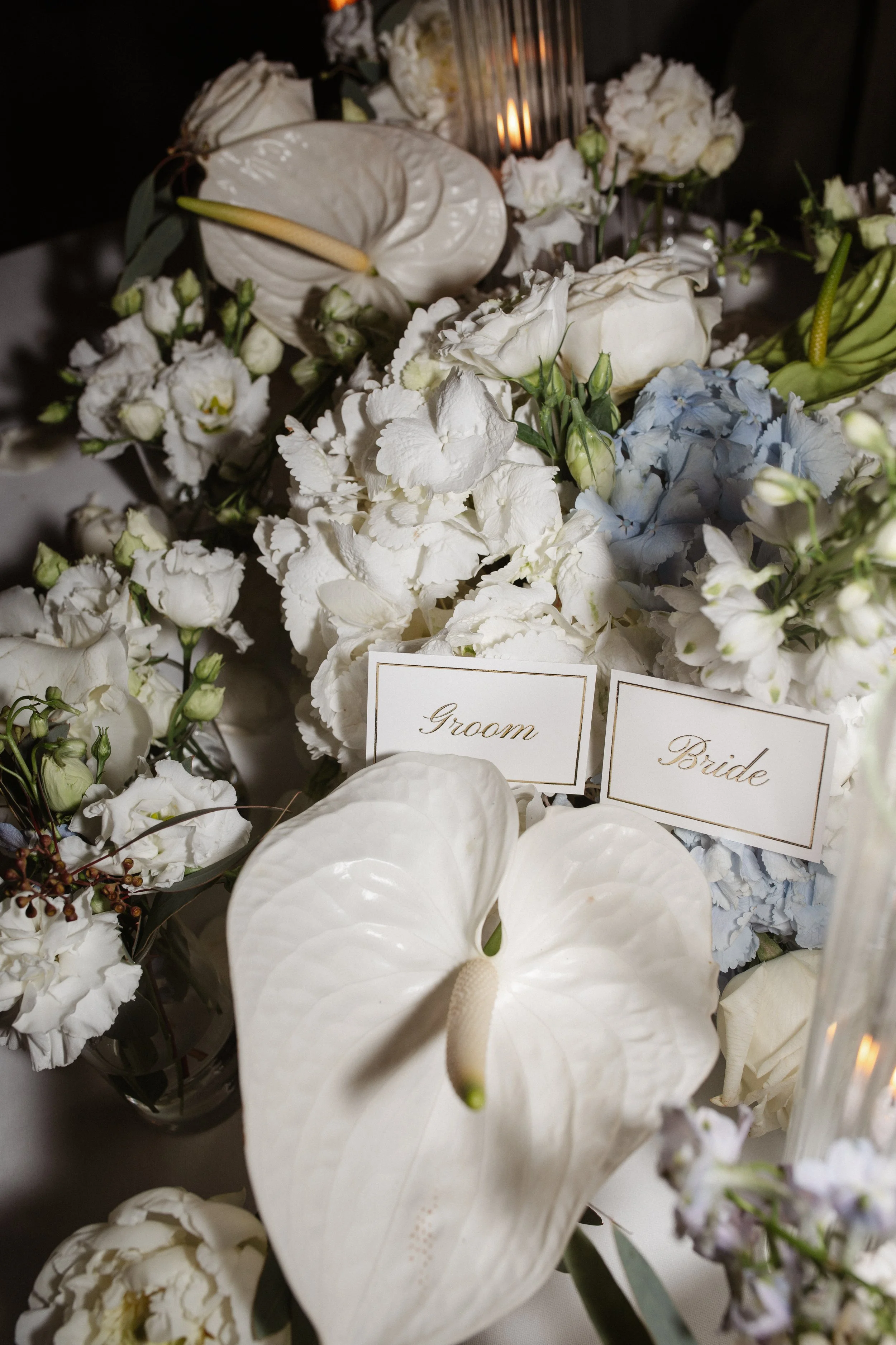 Luxury wedding dinner and reception by the Mediterranean Sea in Cannes, featuring elegant tablescape design, white florals, heartfelt speeches, candlelight, and an intimate celebration on the French Riviera.